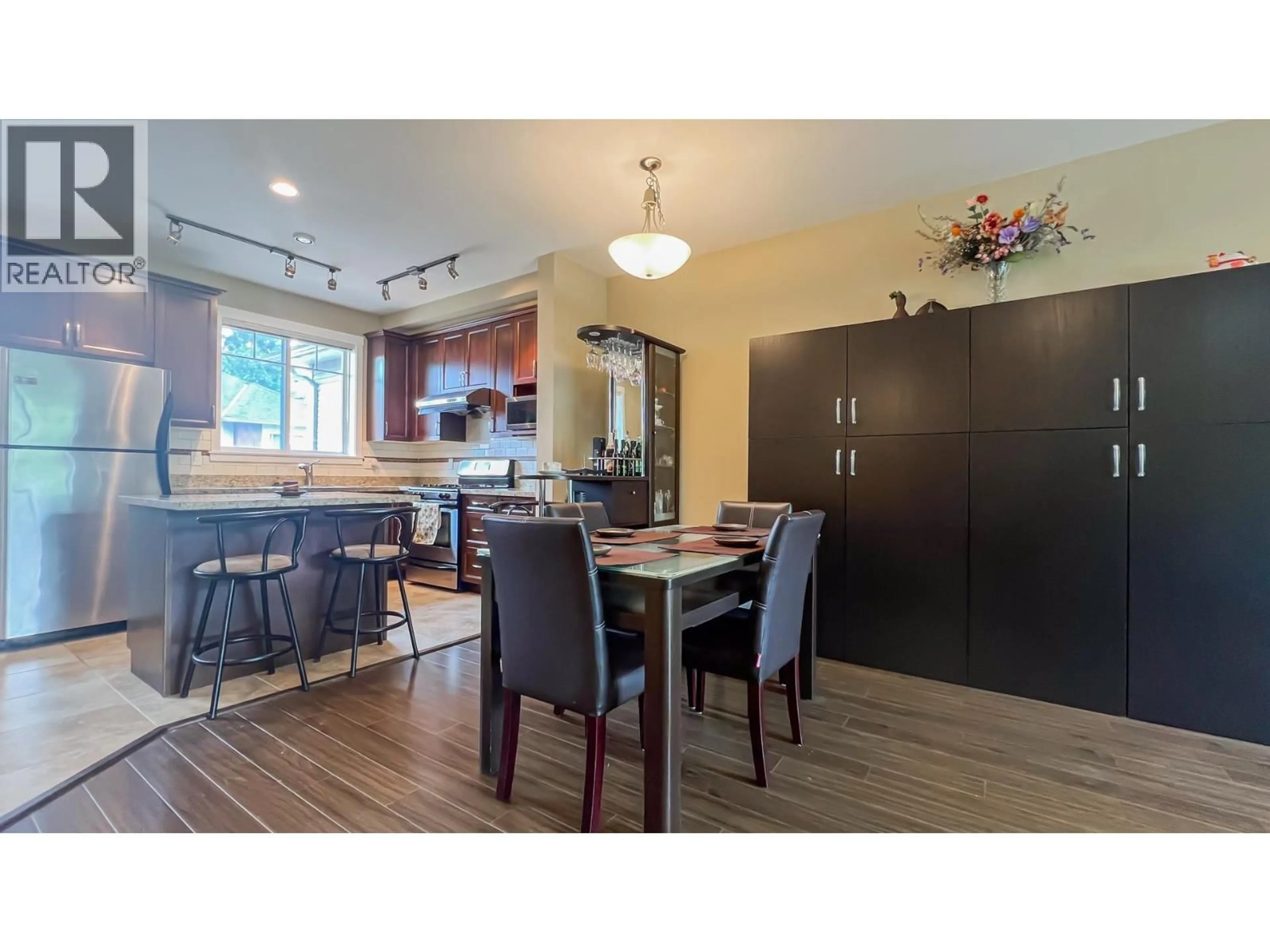 Open concept kitchen, wood/laminate floor for 16 - 11393 STEVESTON HIGHWAY, Richmond British Columbia V7A1N8