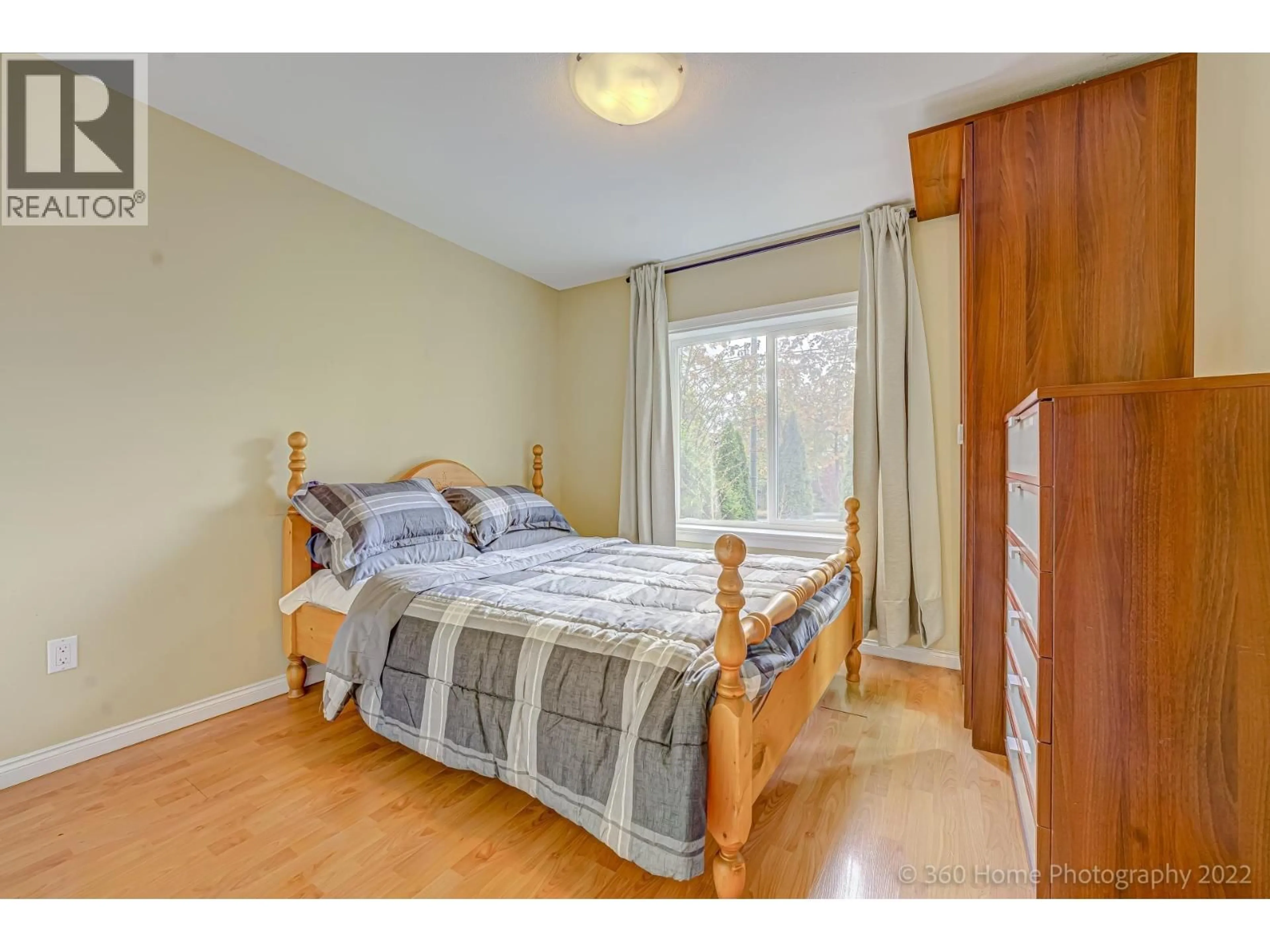 Bedroom with bed, wood/laminate floor for 41 41ST AVENUE, Vancouver British Columbia V5W1N4
