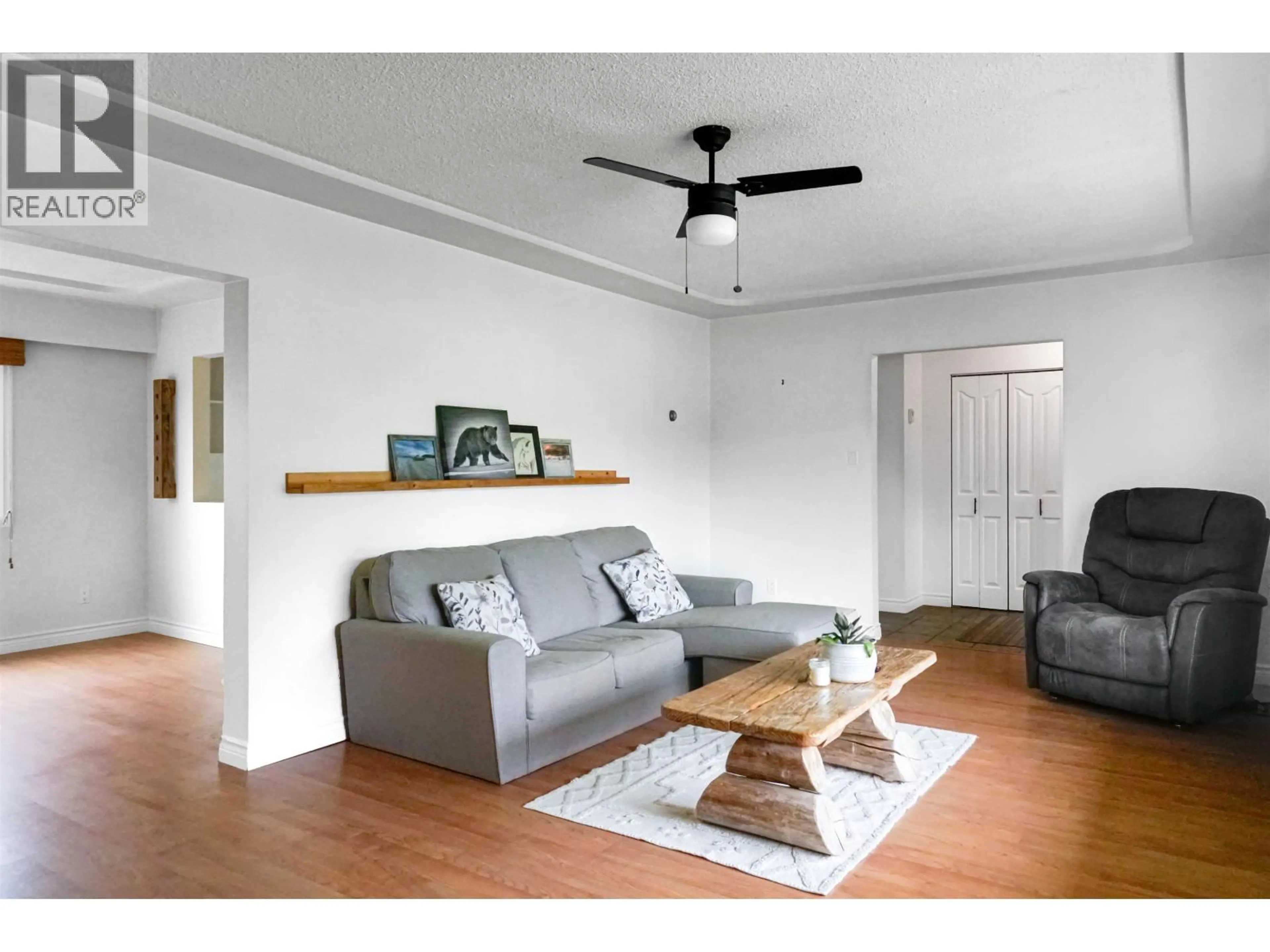 Living room with furniture, wood/laminate floor for 59 BAKER STREET, Kitimat British Columbia V8C1A8