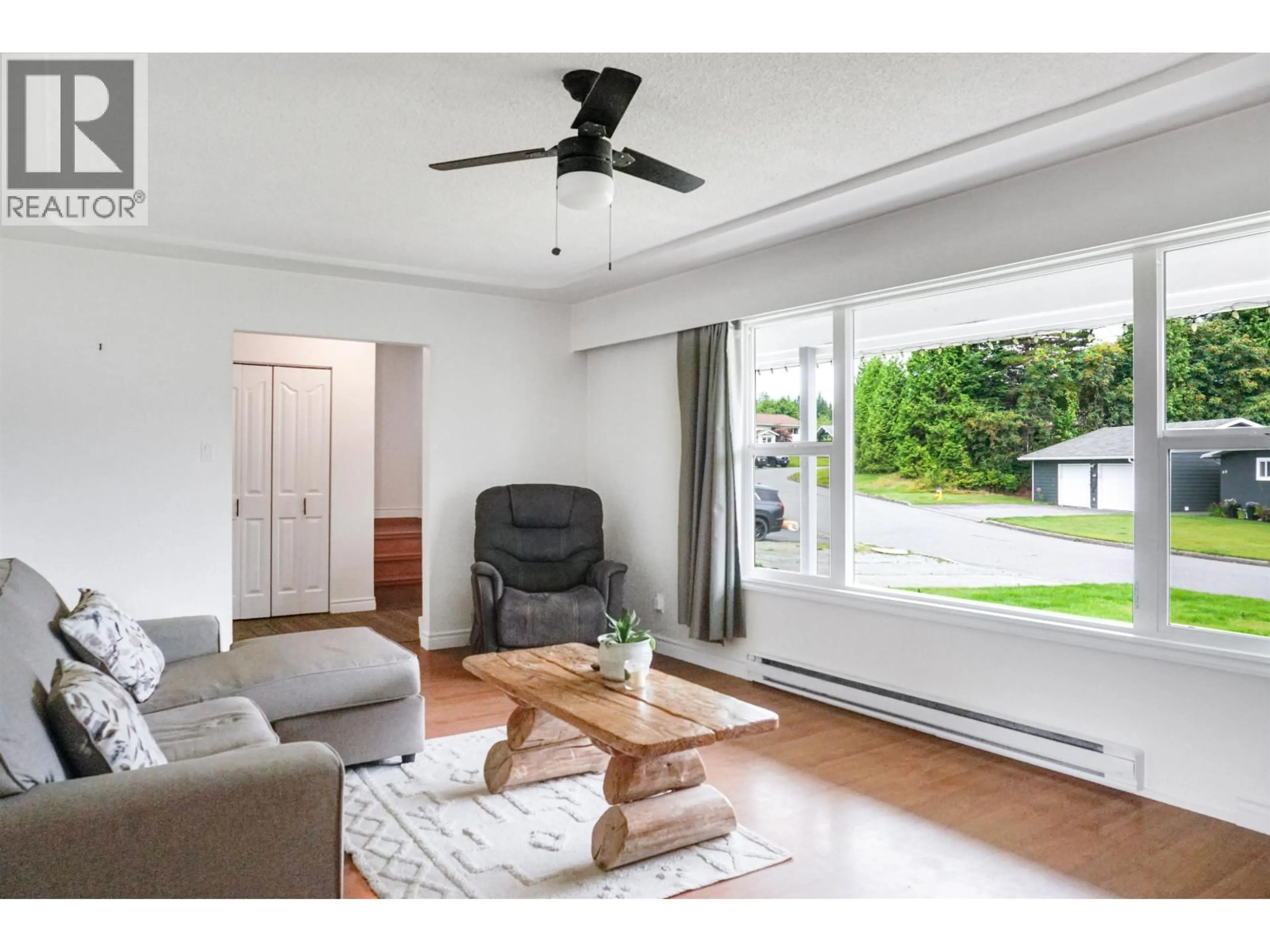 Living room with furniture, wood/laminate floor for 59 BAKER STREET, Kitimat British Columbia V8C1A8