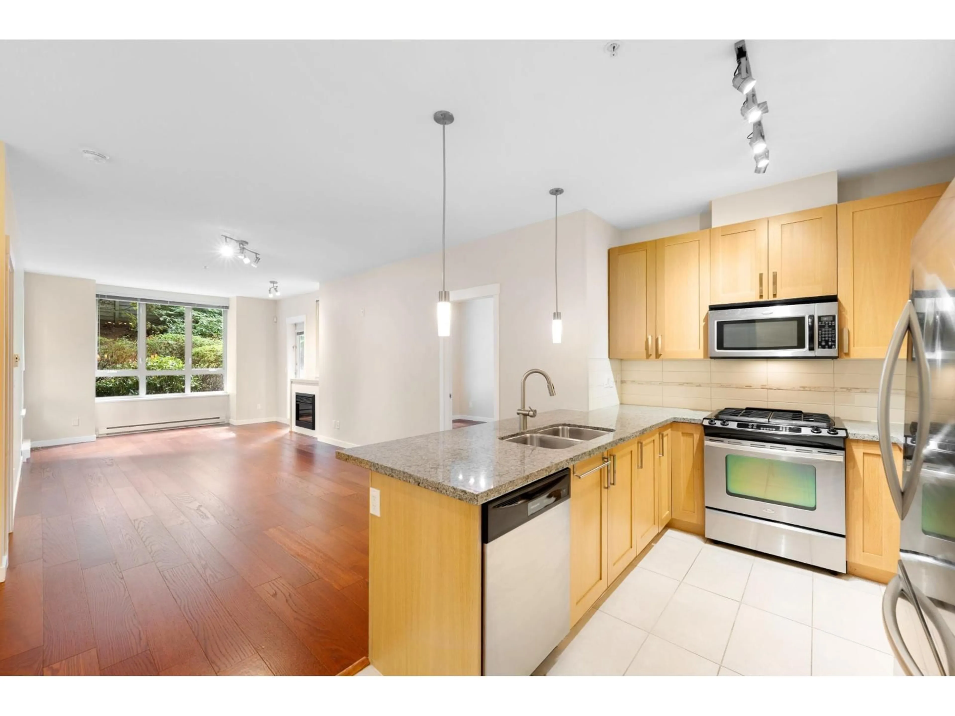 Open concept kitchen, unknown for 122 - 15918 26, Surrey British Columbia V3Z5K3