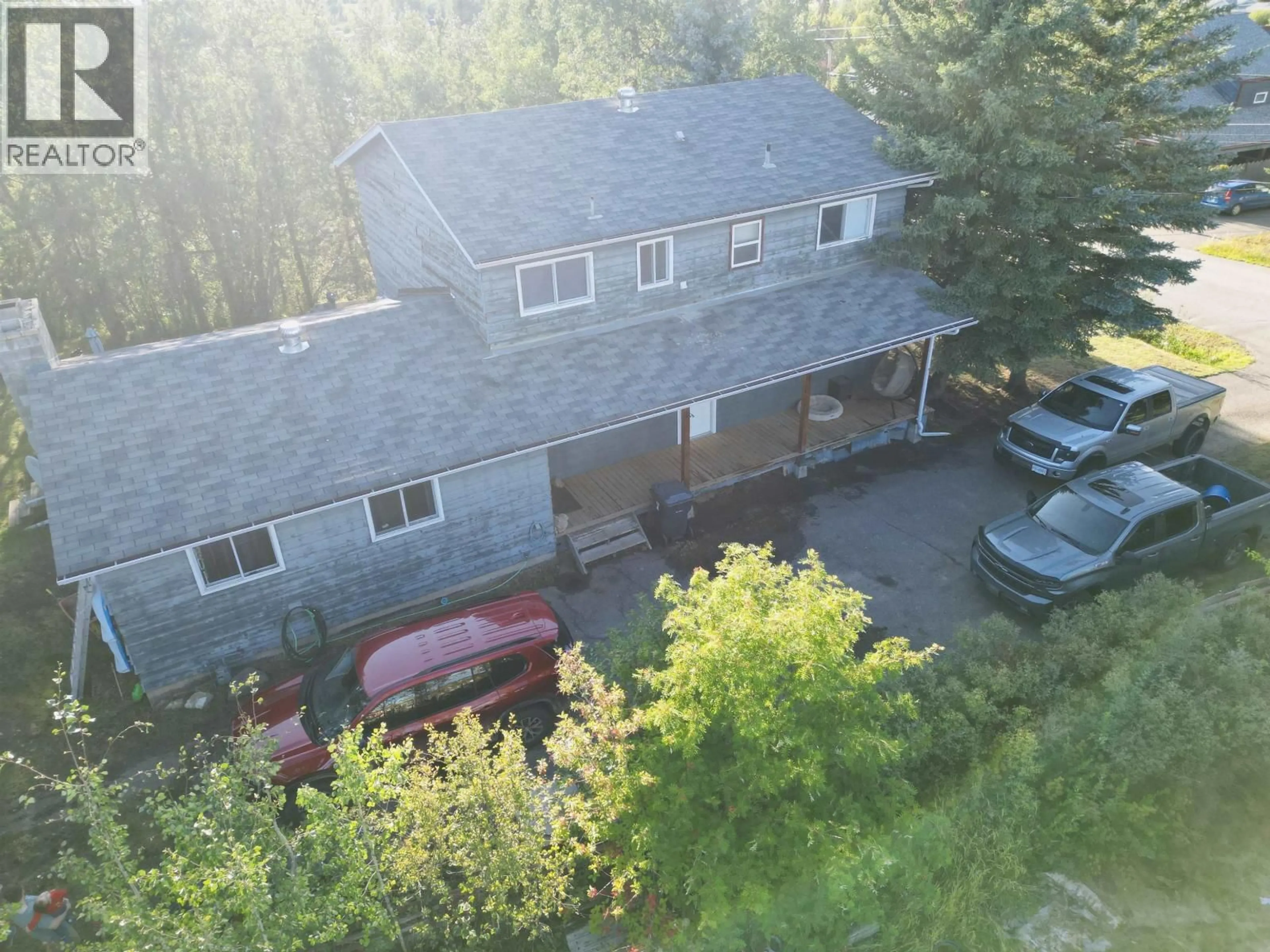 A pic from outside/outdoor area/front of a property/back of a property/a pic from drone, mountain view for 206 5TH AVENUE, Burns Lake British Columbia V0J1E0