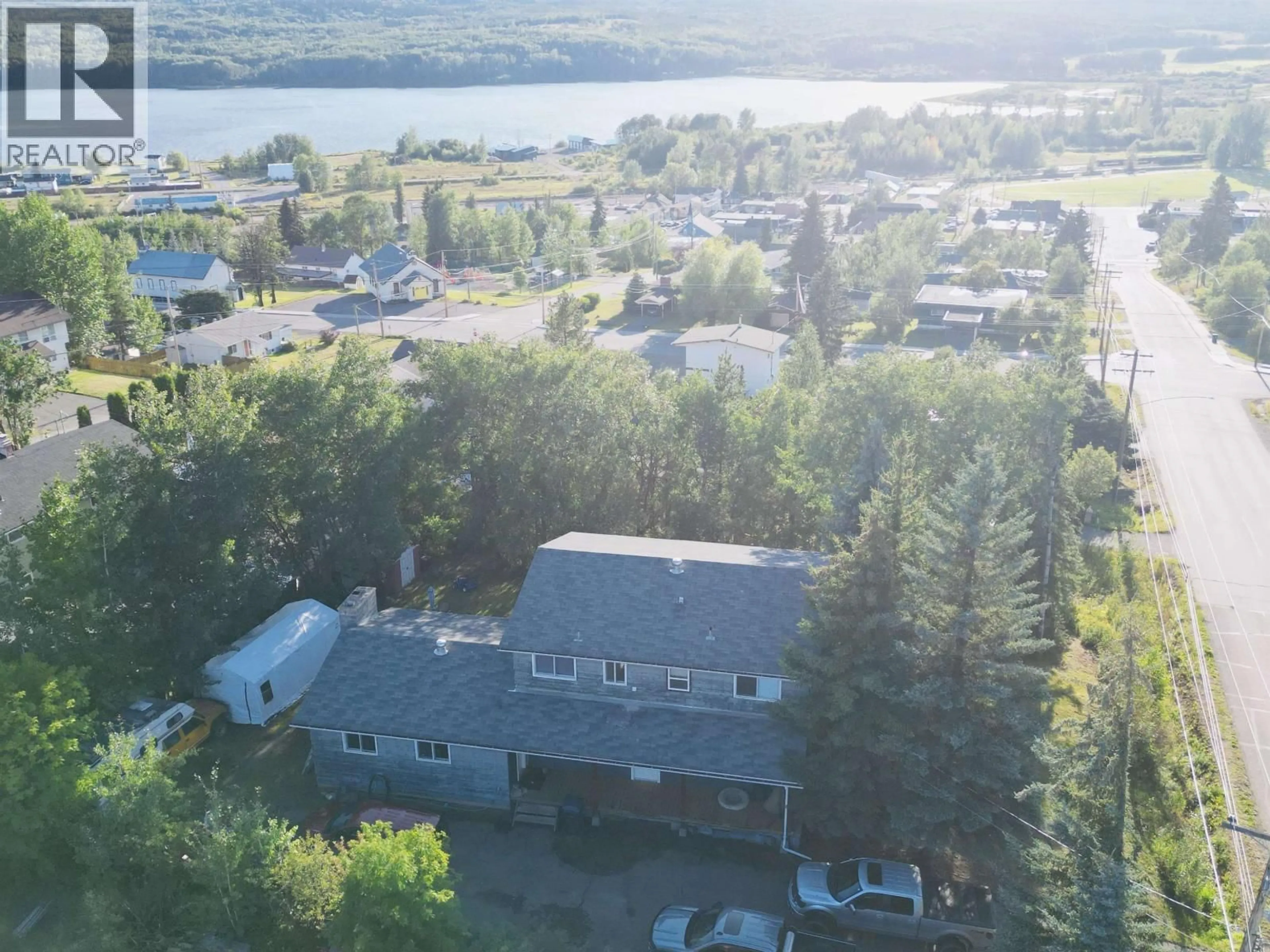 A pic from outside/outdoor area/front of a property/back of a property/a pic from drone, water/lake/river/ocean view for 206 5TH AVENUE, Burns Lake British Columbia V0J1E0