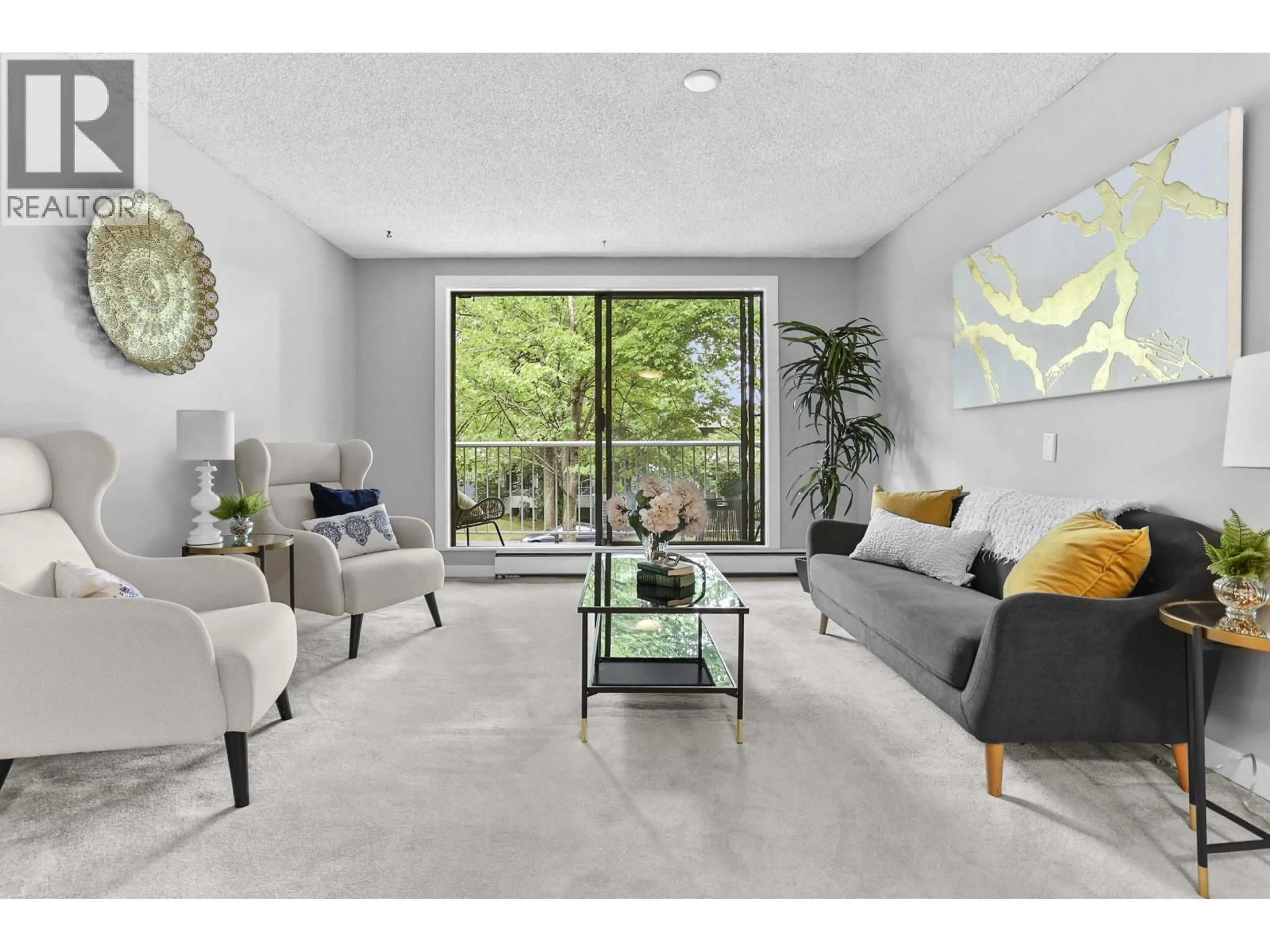 Living room with furniture, unknown for 214 - 3921 CARRIGAN COURT, Burnaby British Columbia V3N4J7
