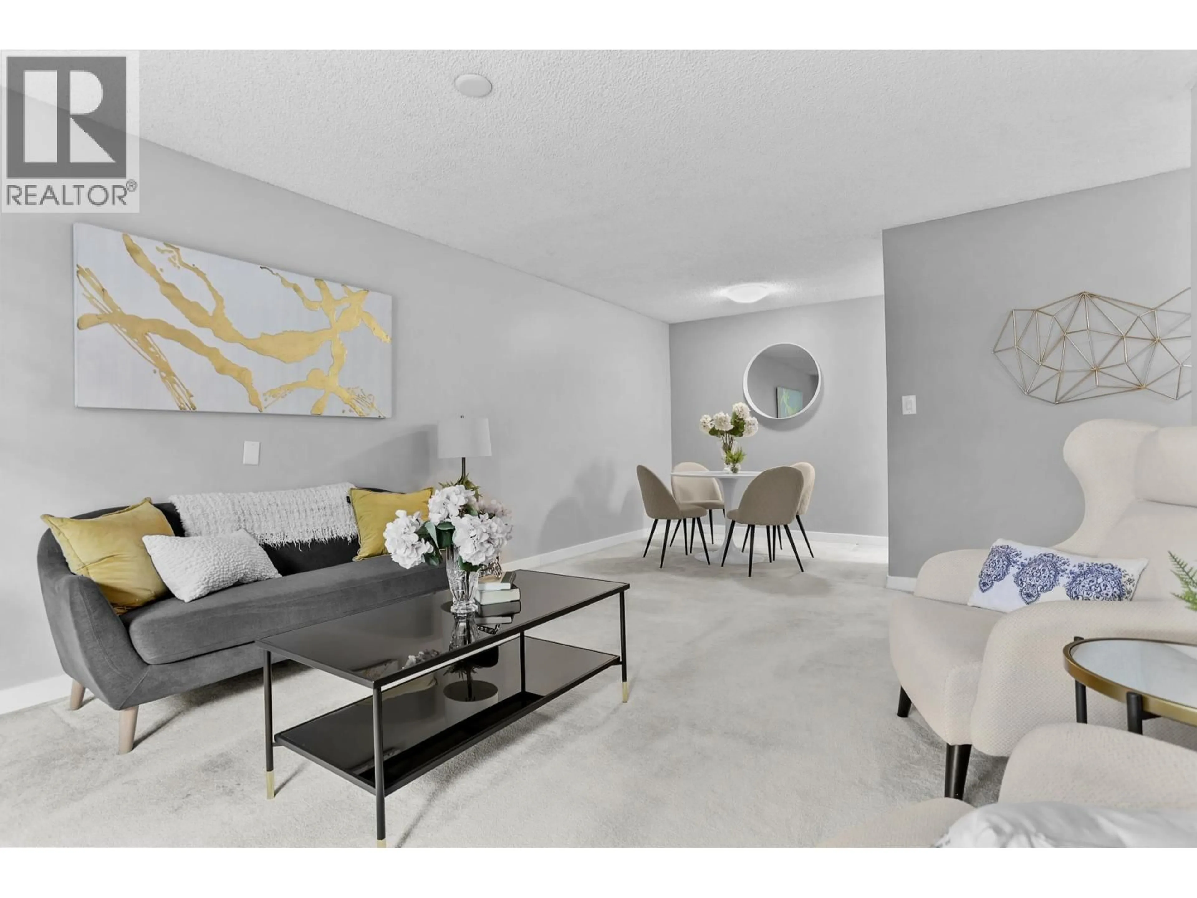 Living room with furniture, unknown for 214 - 3921 CARRIGAN COURT, Burnaby British Columbia V3N4J7
