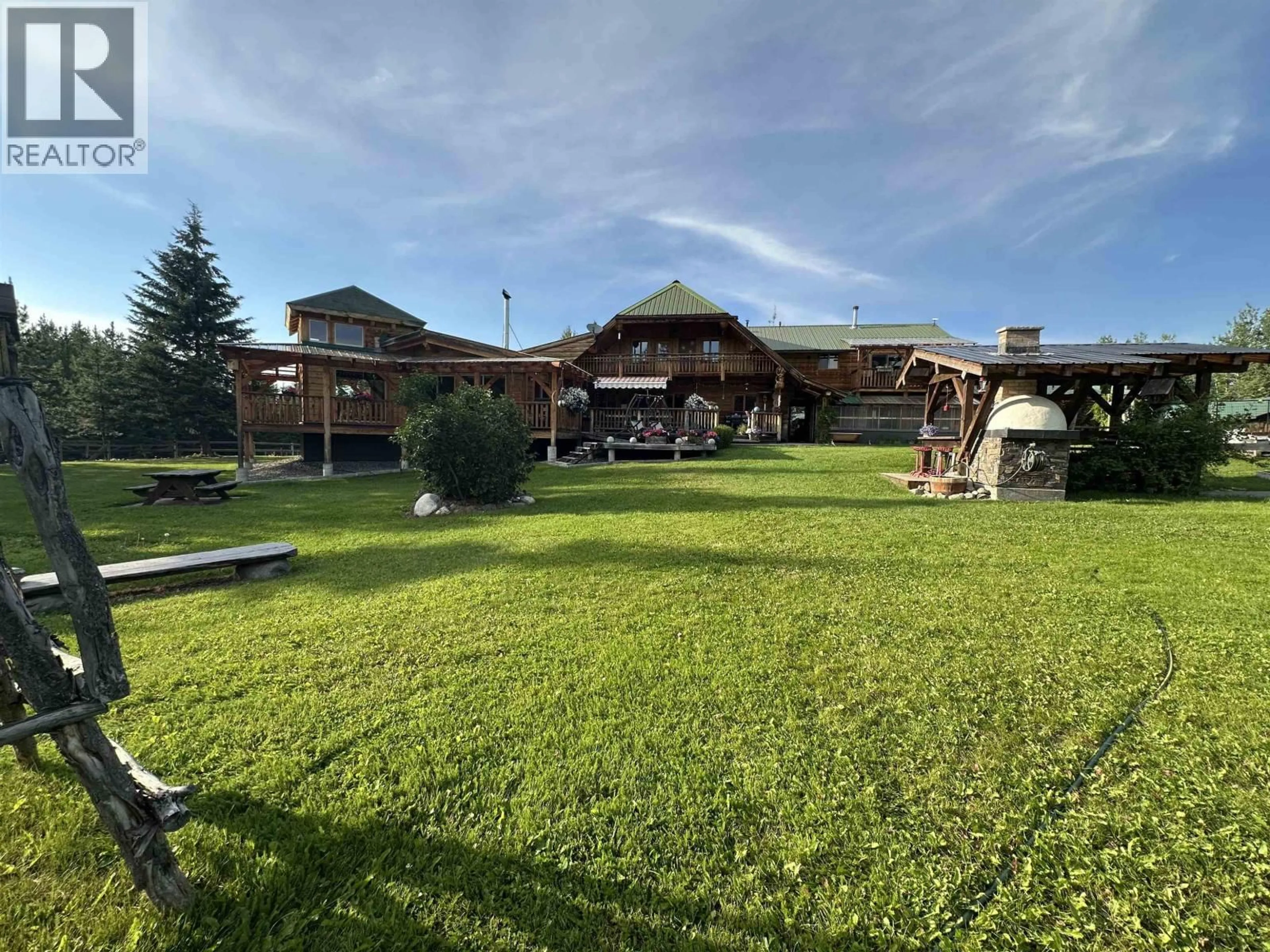 A pic from outside/outdoor area/front of a property/back of a property/a pic from drone, mountain view for 2982 BIG LAKE WEST ROAD, Williams Lake British Columbia V0L1G0