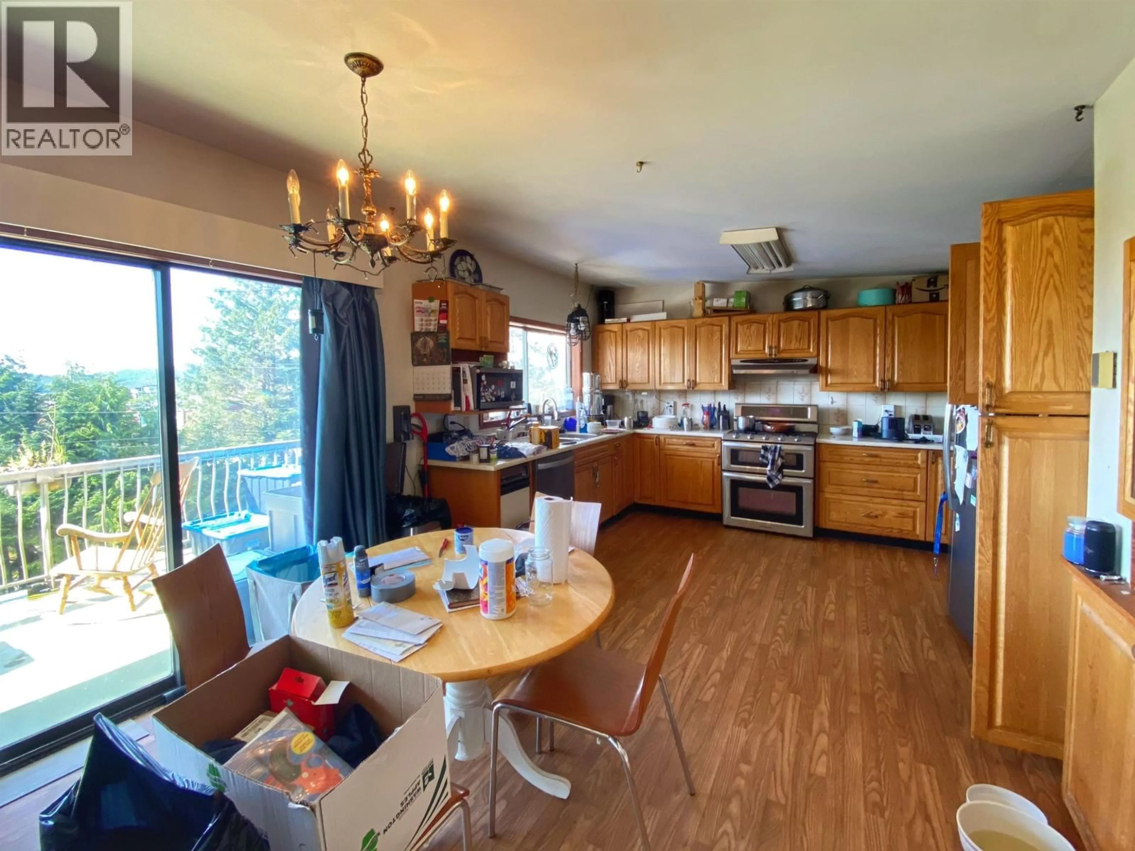 Open concept kitchen, wood/laminate floor for 1105 BORDEN STREET, Prince Rupert British Columbia V8J1V6