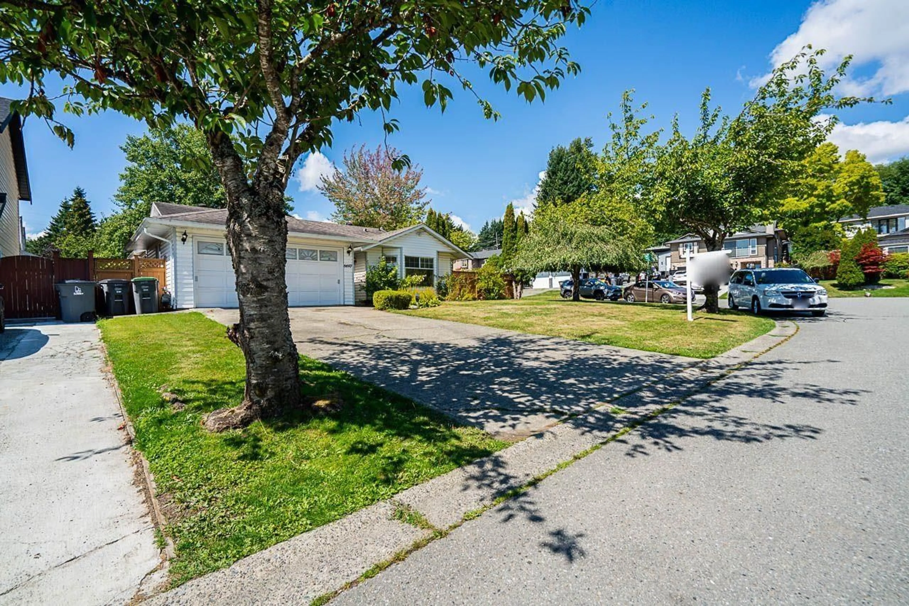 A pic from outside/outdoor area/front of a property/back of a property/a pic from drone, street for 6697 141A, Surrey British Columbia V3W9N8