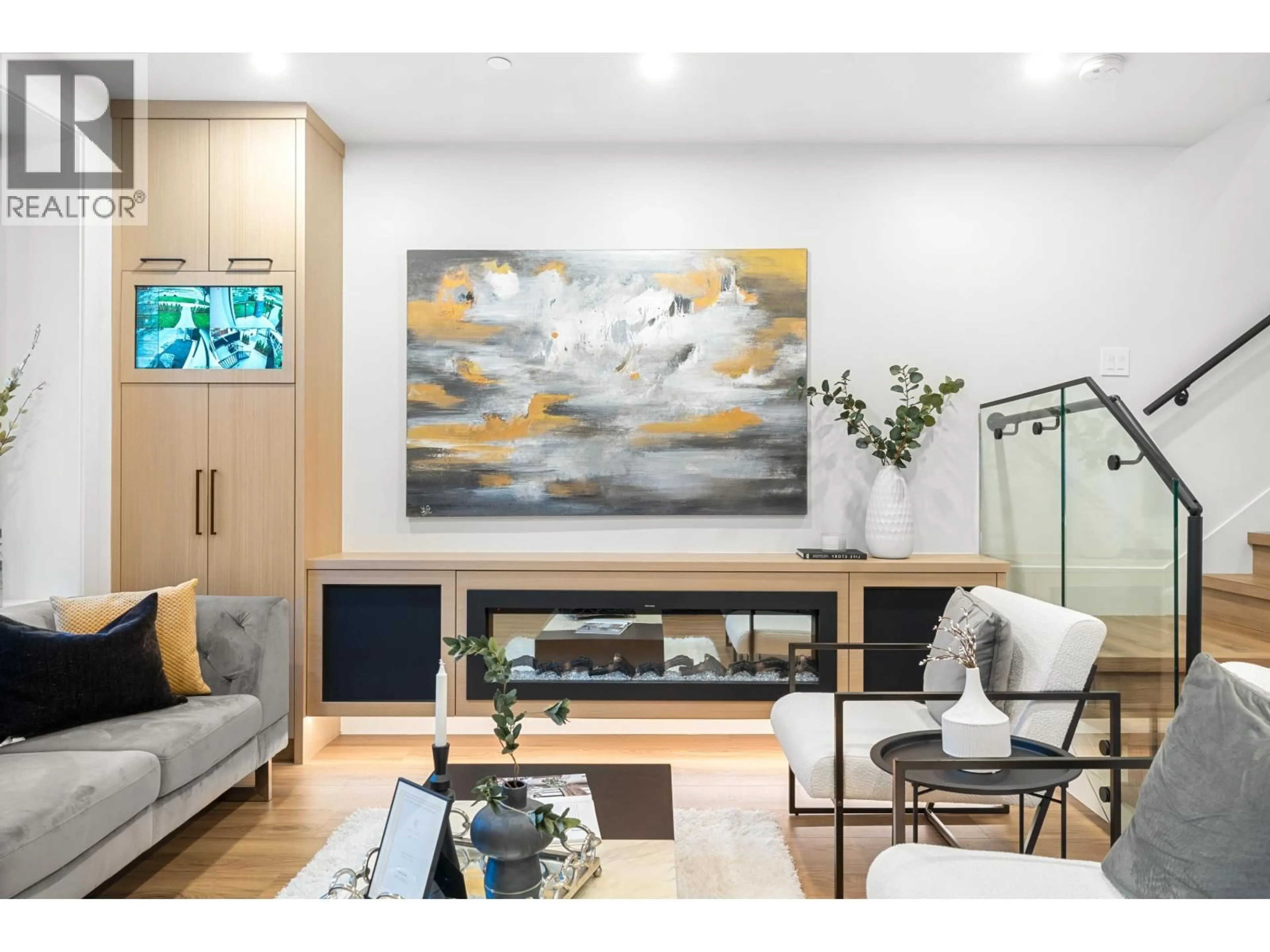 Living room with furniture, wood/laminate floor for 1810 55TH AVENUE, Vancouver British Columbia V5P2A1