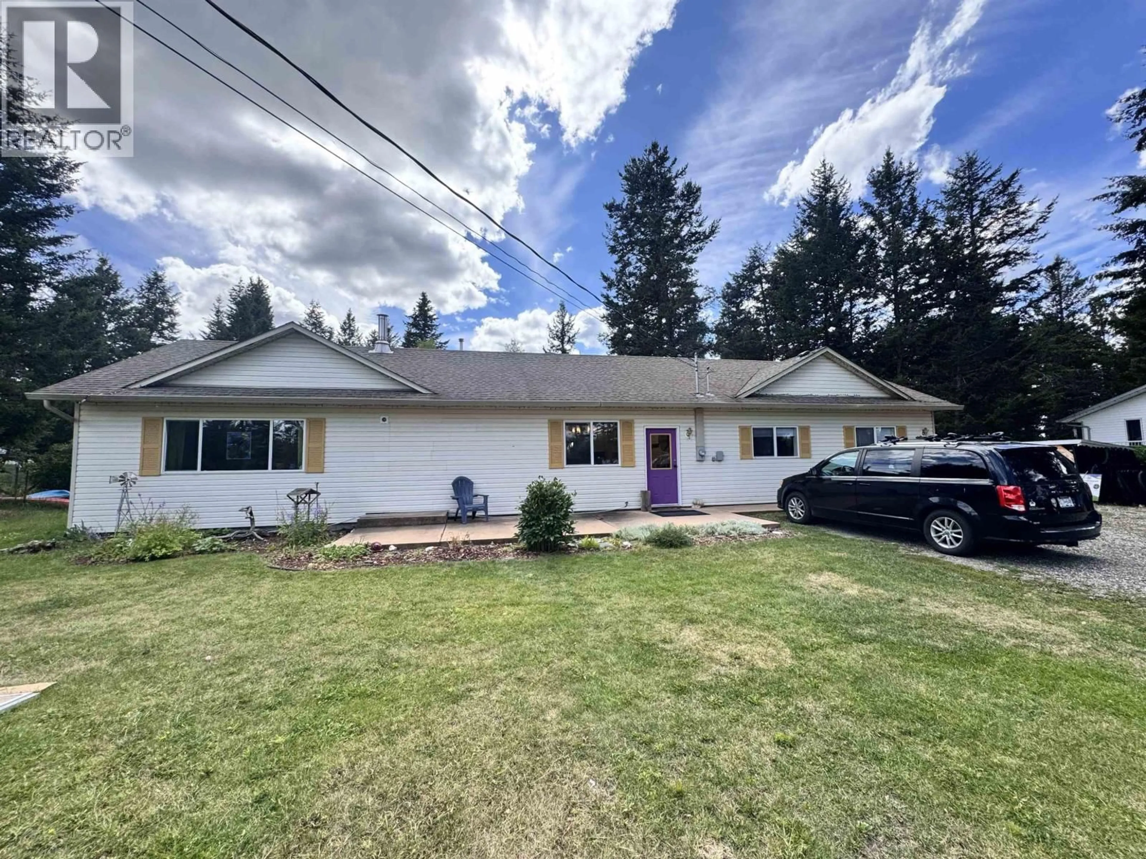 A pic from outside/outdoor area/front of a property/back of a property/a pic from drone, street for 4990 DONSLEEQUA ROAD, 108 Mile Ranch British Columbia V0K2Z0
