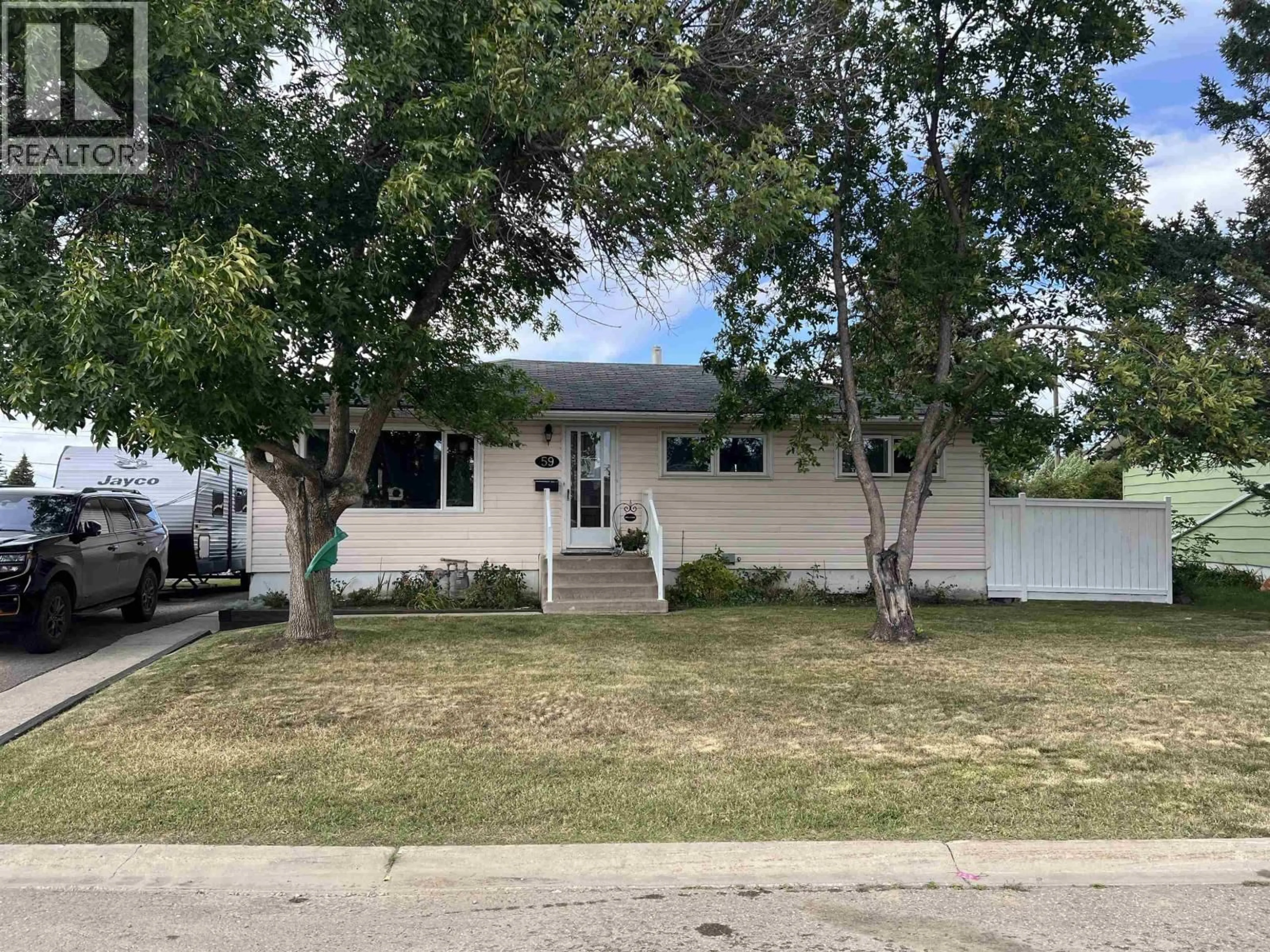 Home with vinyl exterior material, street for 59 PRINCESS CRESCENT, Fort St. John British Columbia V1J2R4