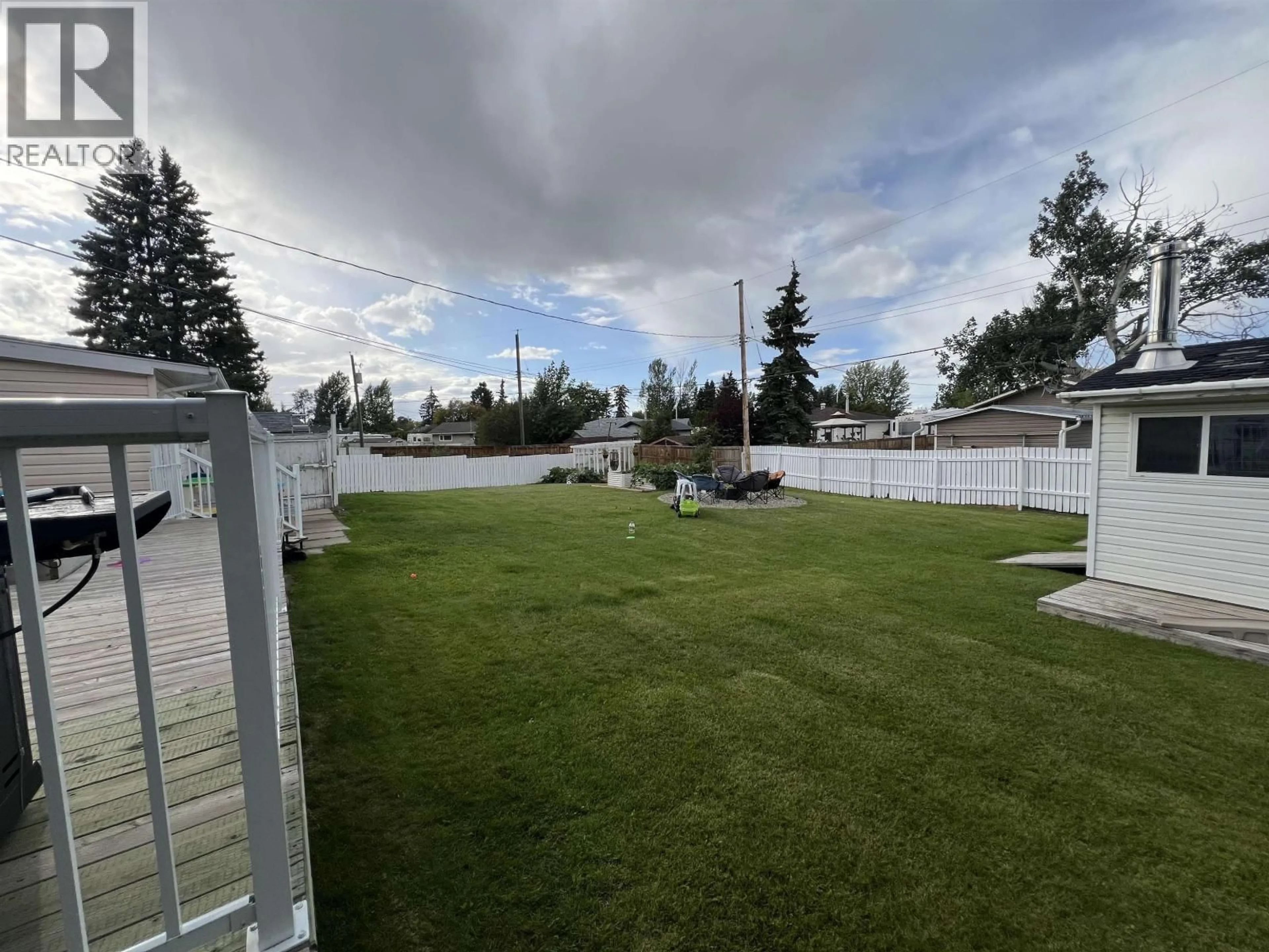 A pic from outside/outdoor area/front of a property/back of a property/a pic from drone, water/lake/river/ocean view for 59 PRINCESS CRESCENT, Fort St. John British Columbia V1J2R4