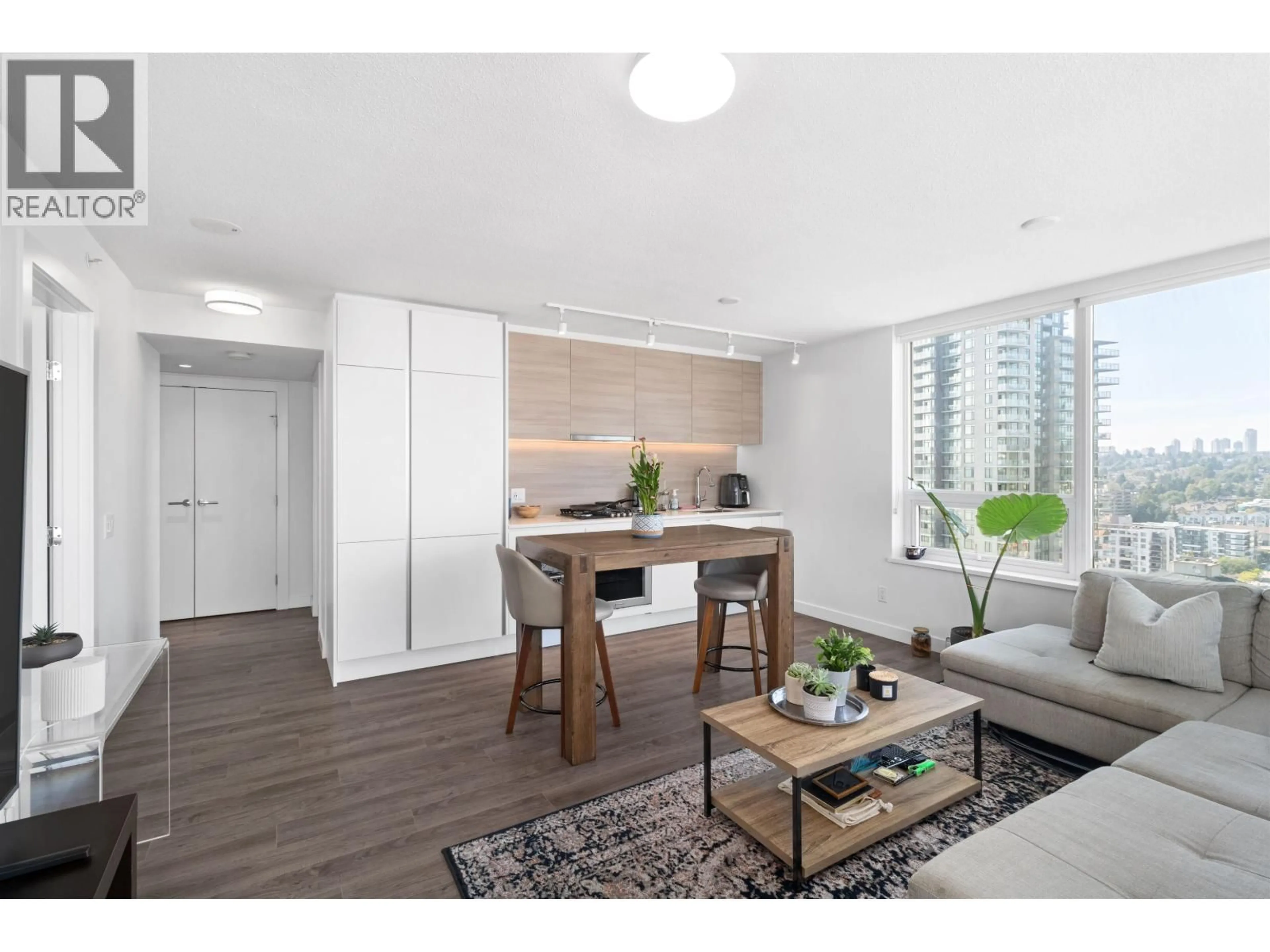 Living room with furniture, wood/laminate floor for 2711 - 908 QUAYSIDE DRIVE, New Westminster British Columbia V3M0L4