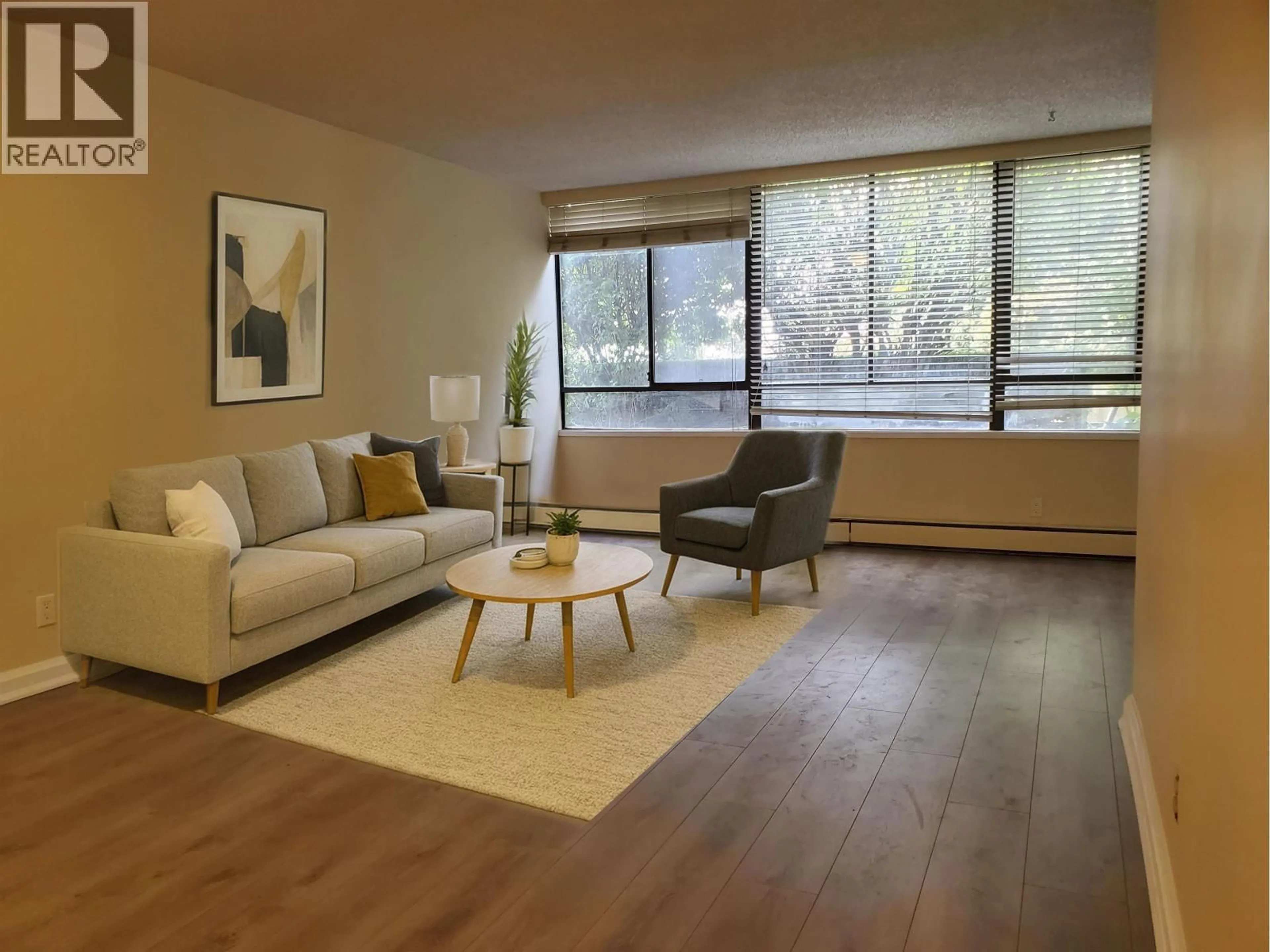 Living room with furniture, unknown for 103 - 460 WESTVIEW STREET, Coquitlam British Columbia V3K6C9