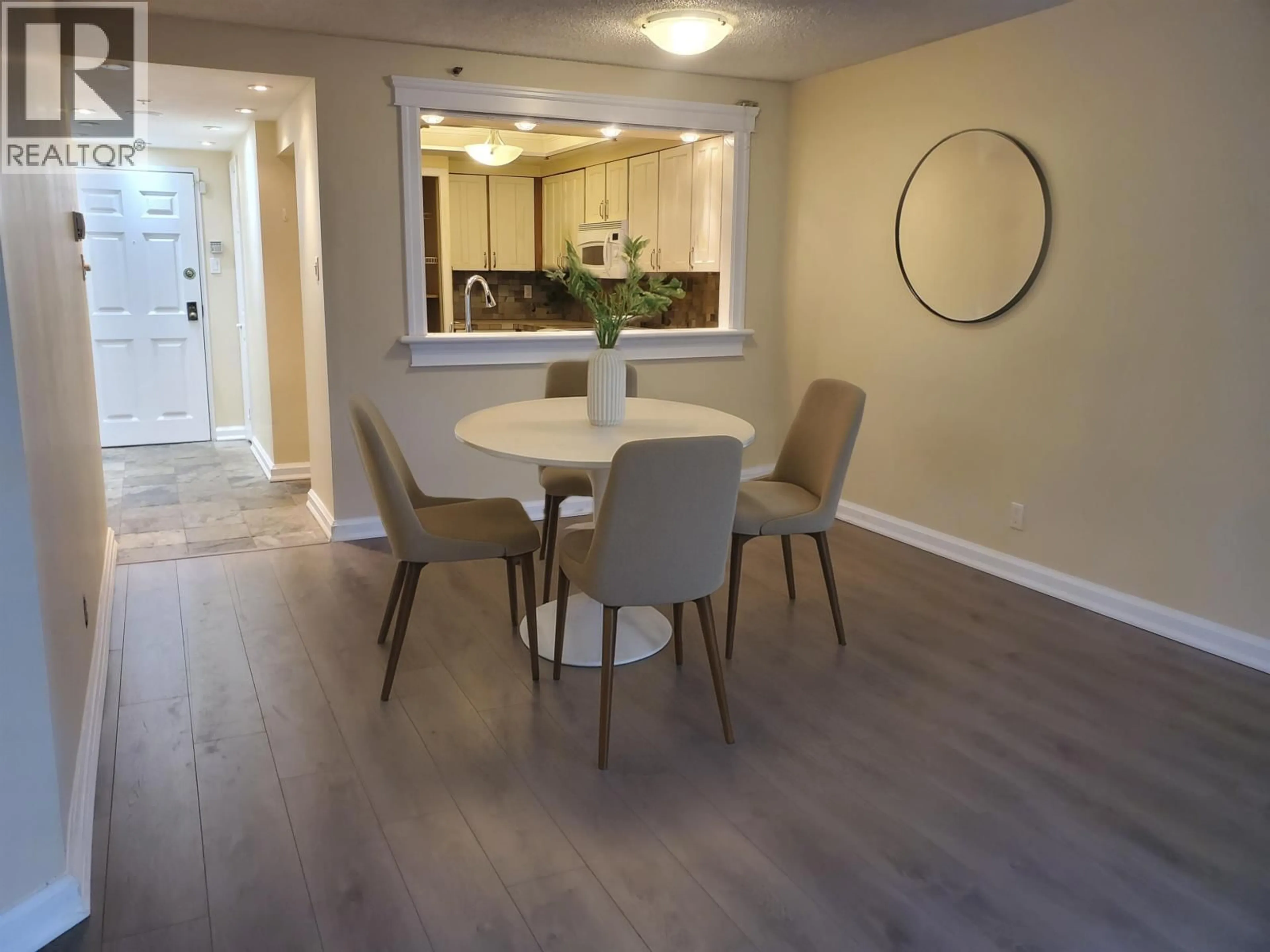 Dining room, wood/laminate floor for 103 - 460 WESTVIEW STREET, Coquitlam British Columbia V3K6C9