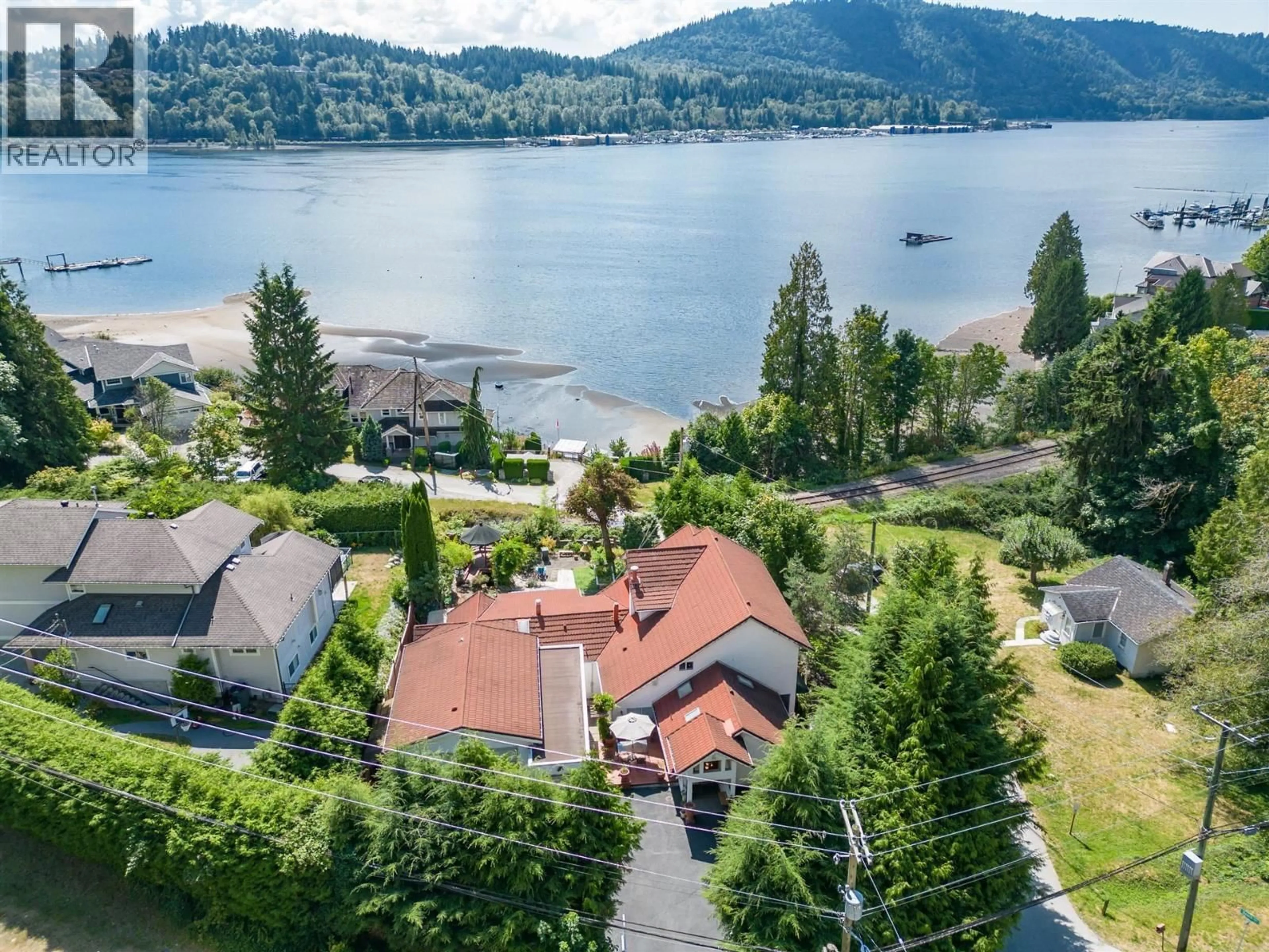 A pic from outside/outdoor area/front of a property/back of a property/a pic from drone, water/lake/river/ocean view for 1650 IOCO ROAD, Port Moody British Columbia V3H3S8