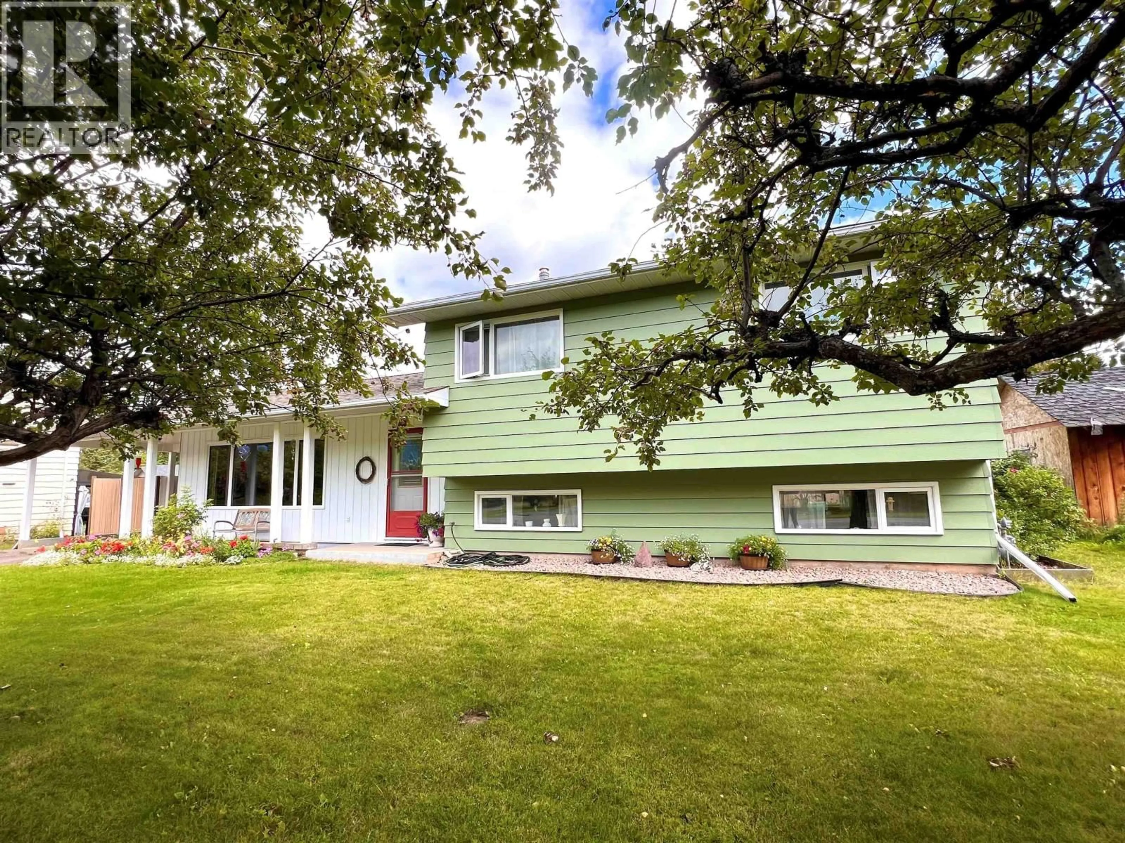 Home with vinyl exterior material, street for 4172 7TH AVENUE, Smithers British Columbia V0J2N0