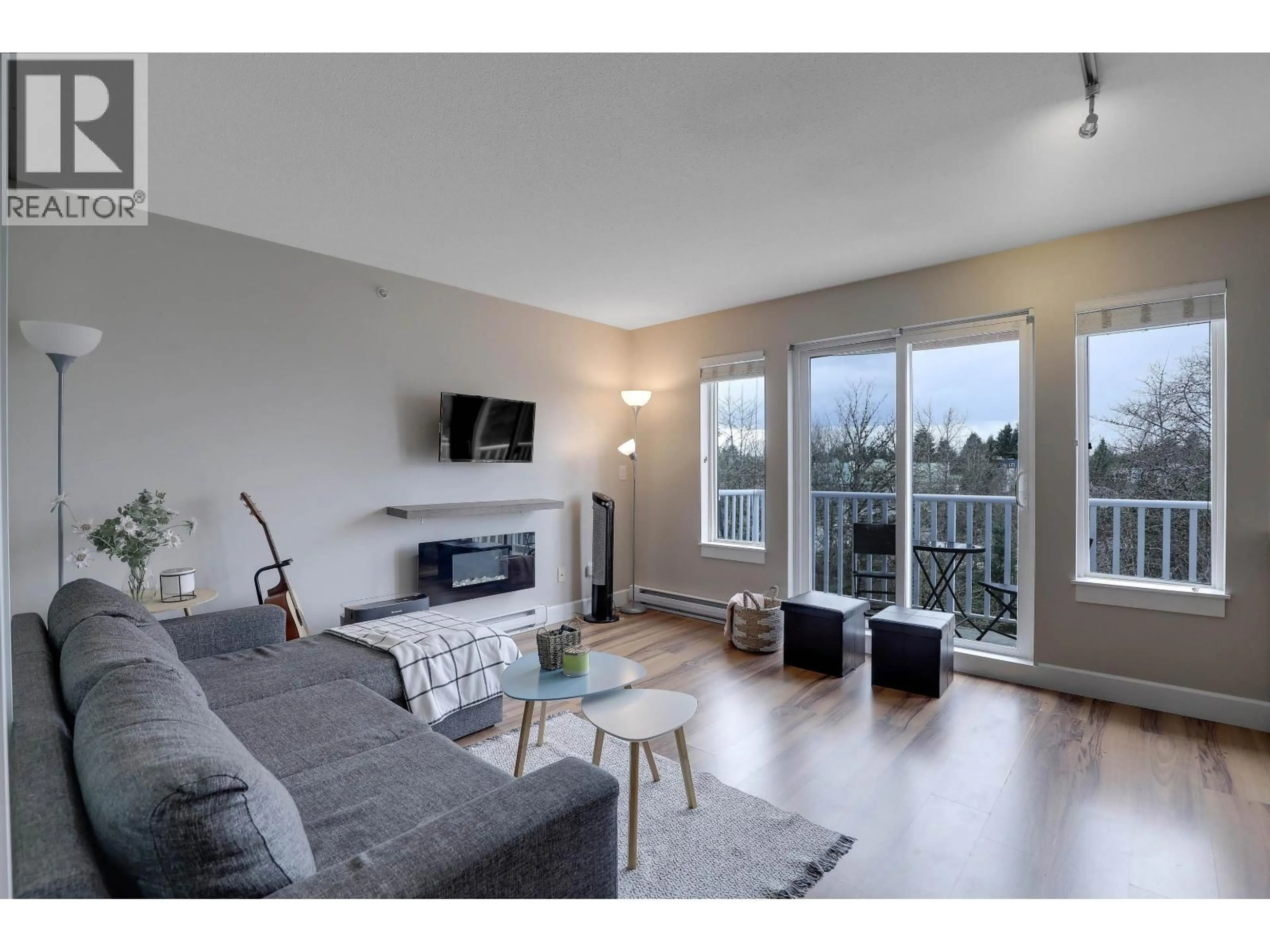 Living room with furniture, wood/laminate floor for 408 - 12283 224TH STREET, Maple Ridge British Columbia V2X8Z3