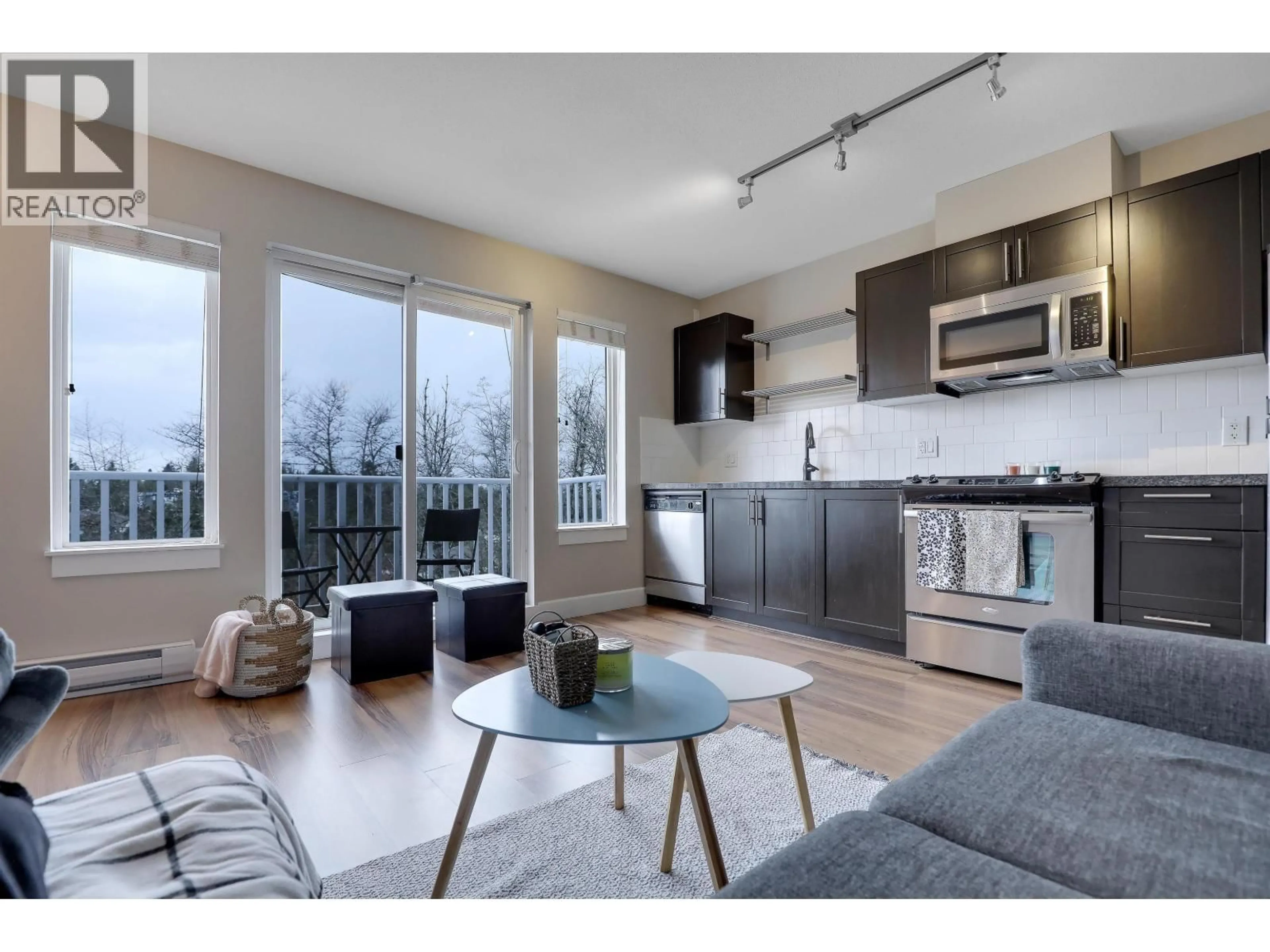 Open concept kitchen, wood/laminate floor for 408 - 12283 224TH STREET, Maple Ridge British Columbia V2X8Z3