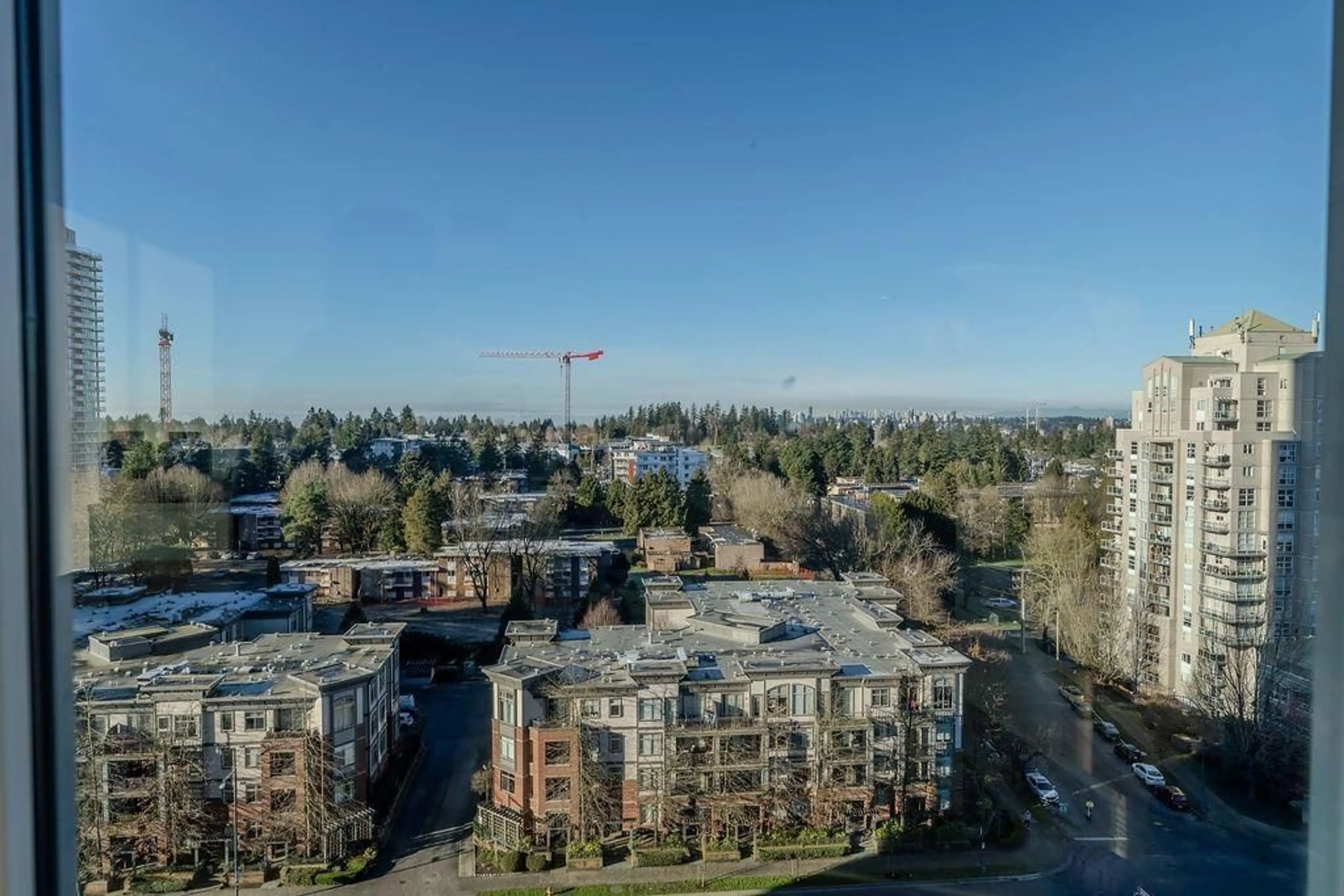 A pic from outside/outdoor area/front of a property/back of a property/a pic from drone, city buildings view from balcony for 1310 - 13428 105, Surrey British Columbia V3T0S6