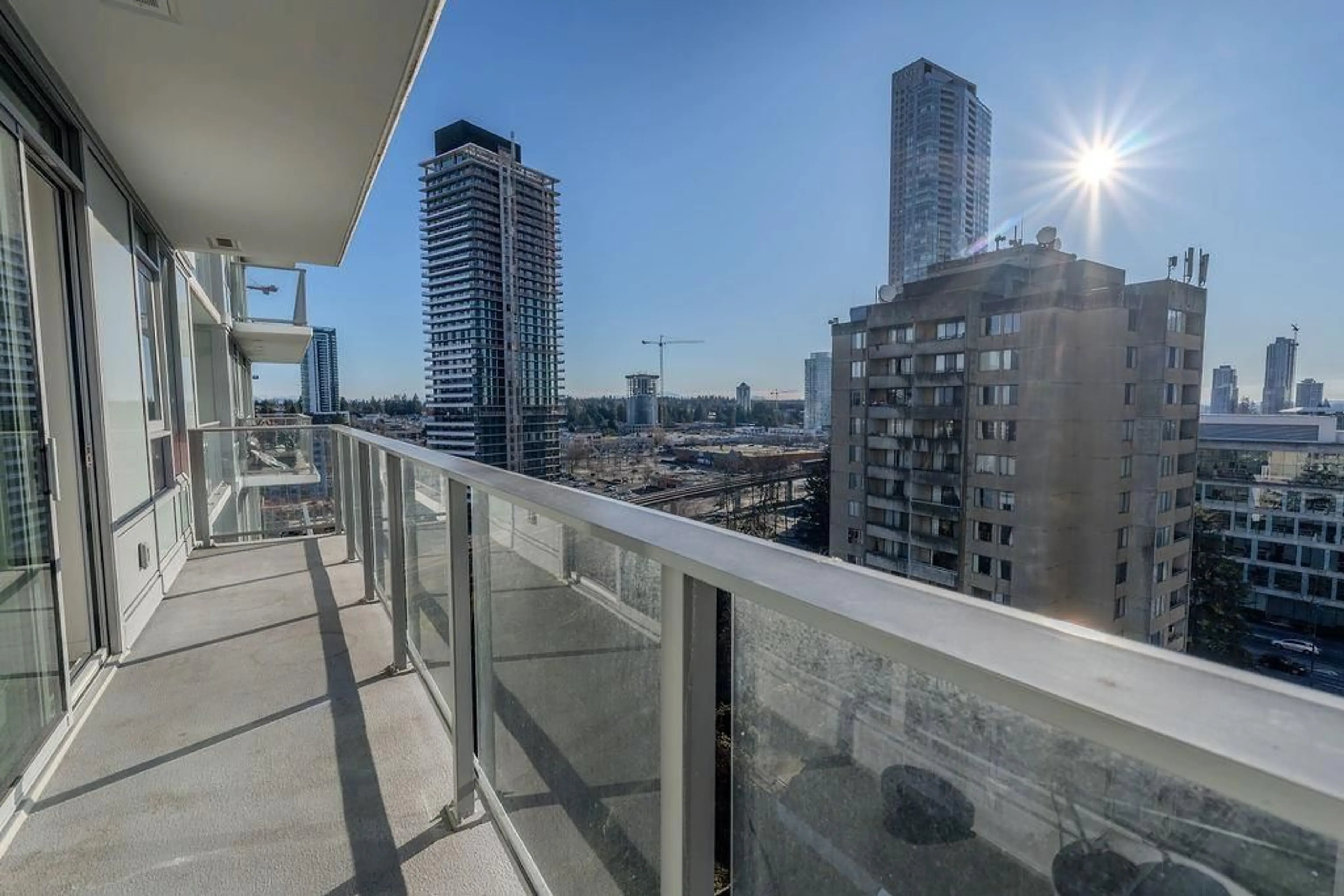 Balcony in the apartment, city buildings view from balcony for 1310 - 13428 105, Surrey British Columbia V3T0S6
