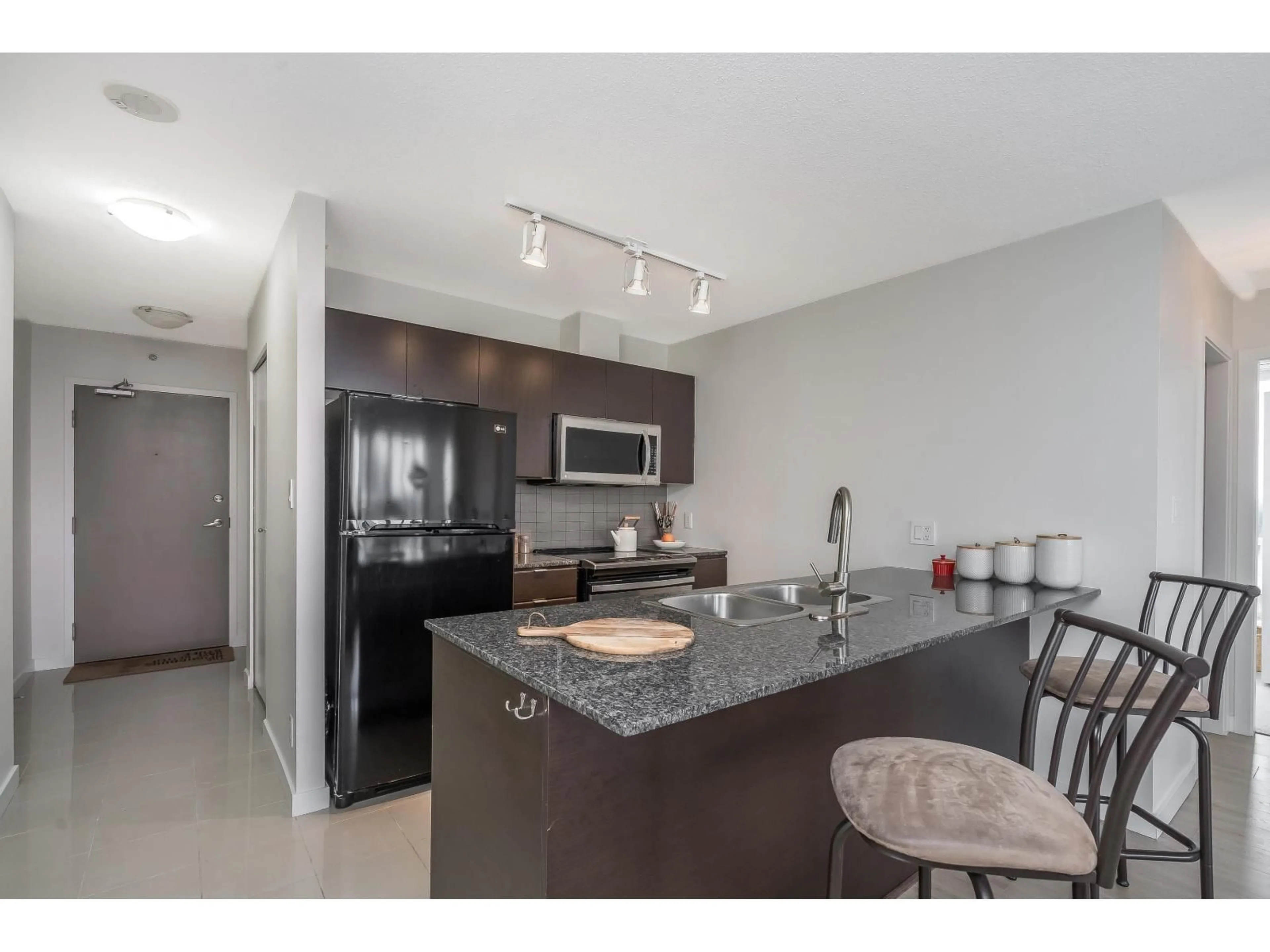 Open concept kitchen, unknown for 1102 - 13618 100, Surrey British Columbia V3T0A8