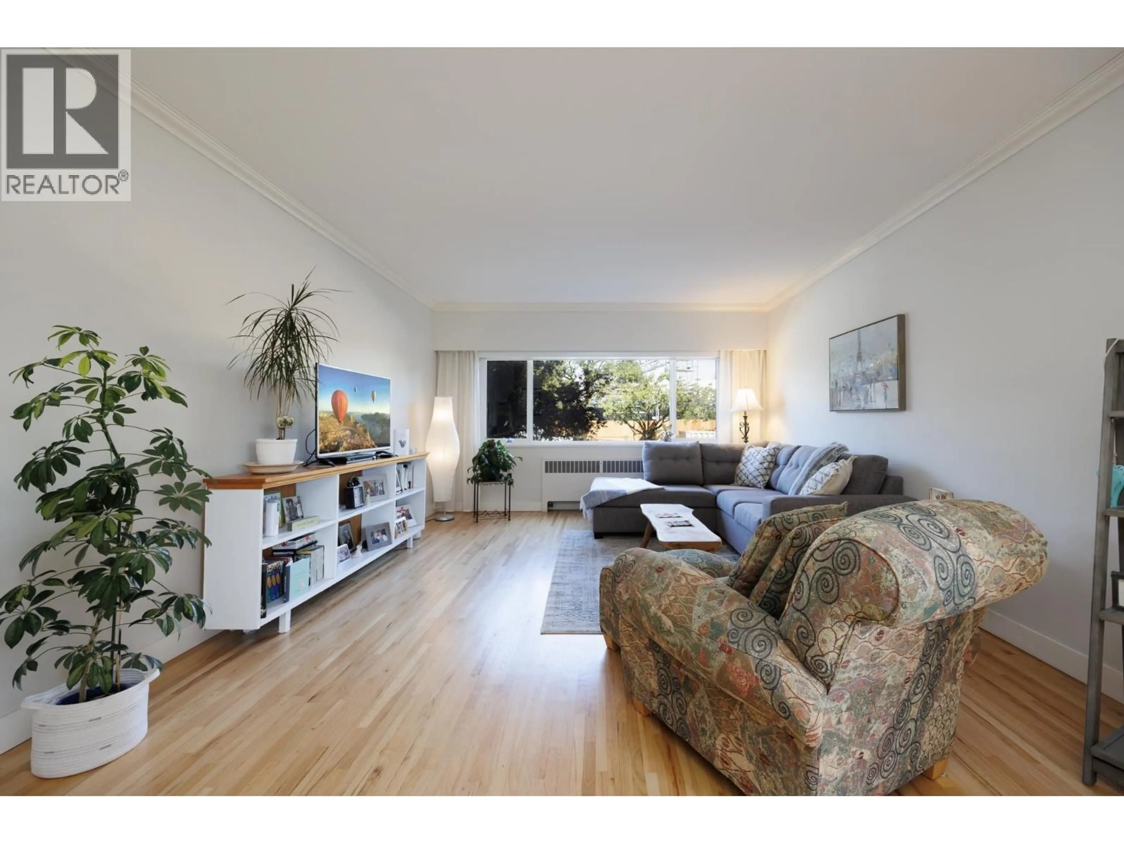 Living room with furniture, unknown for 101 - 2146 43RD AVENUE, Vancouver British Columbia V6M2E1