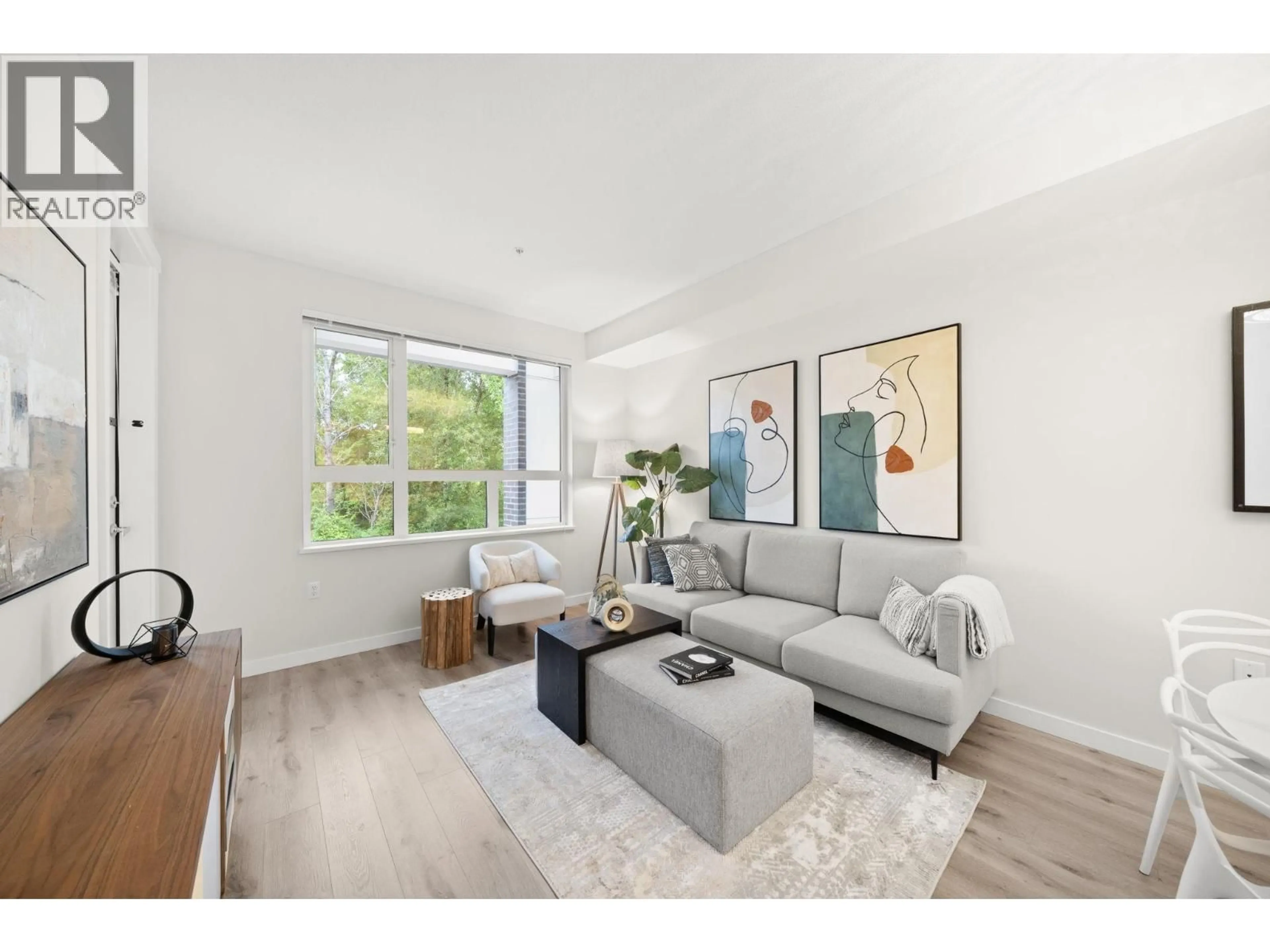 Living room with furniture, unknown for 206 - 9213 ODLIN ROAD, Richmond British Columbia V6X0V5
