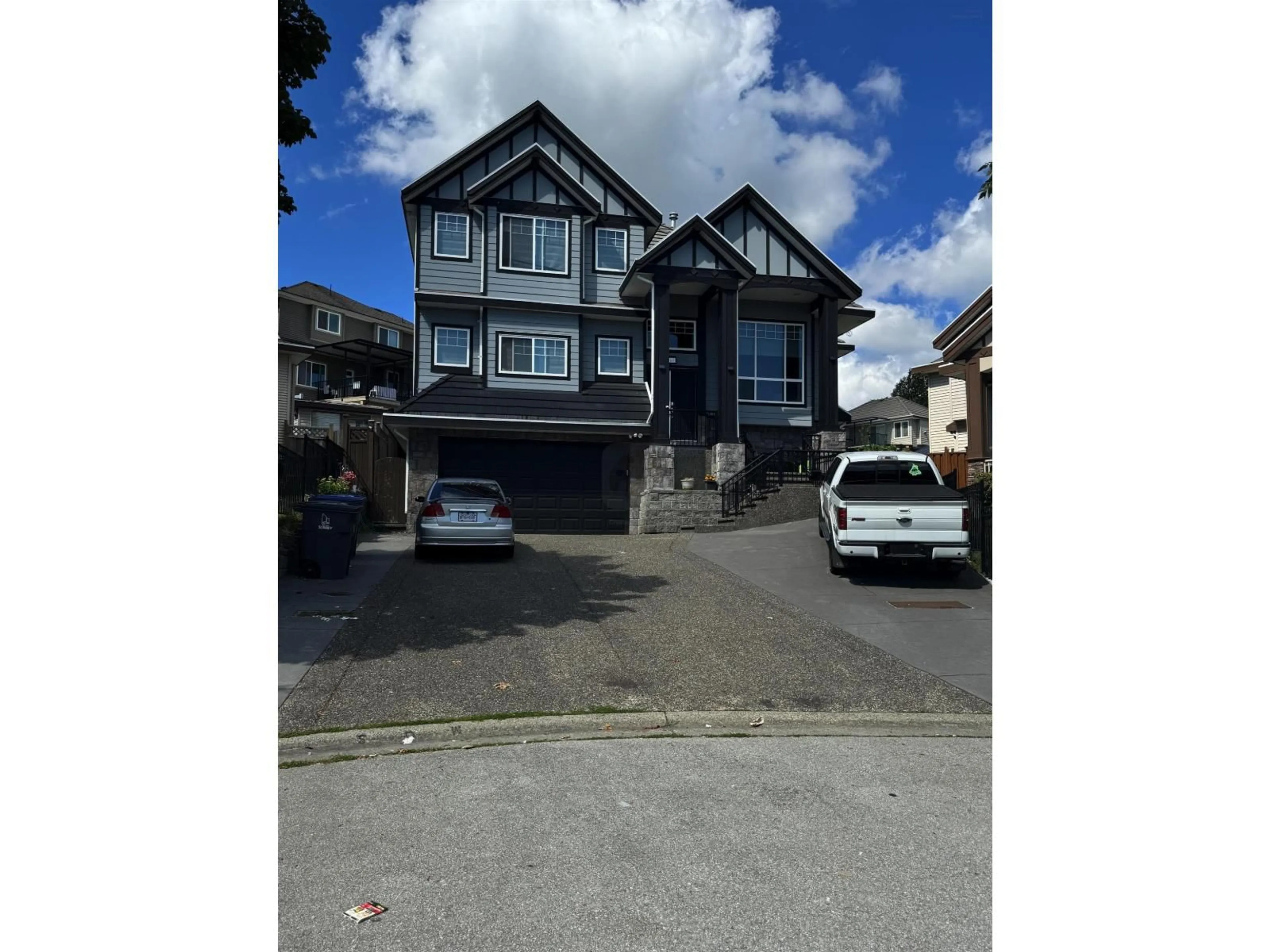 A pic from outside/outdoor area/front of a property/back of a property/a pic from drone, street for 7171 151, Surrey British Columbia V3S7Y8