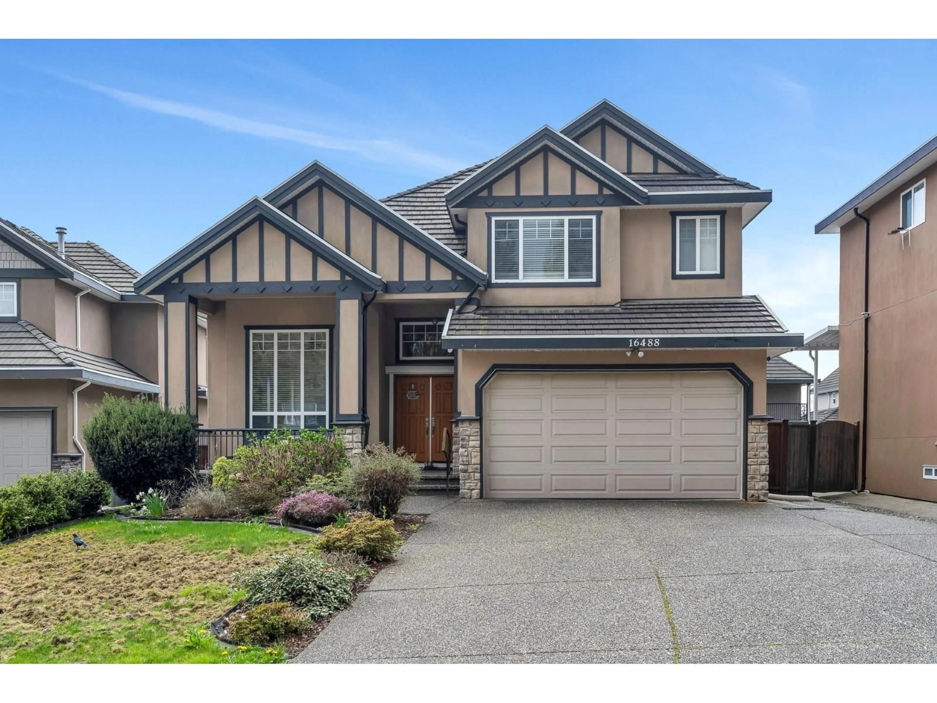 Home with vinyl exterior material, street for 16488 104A, Surrey British Columbia V4N5S6