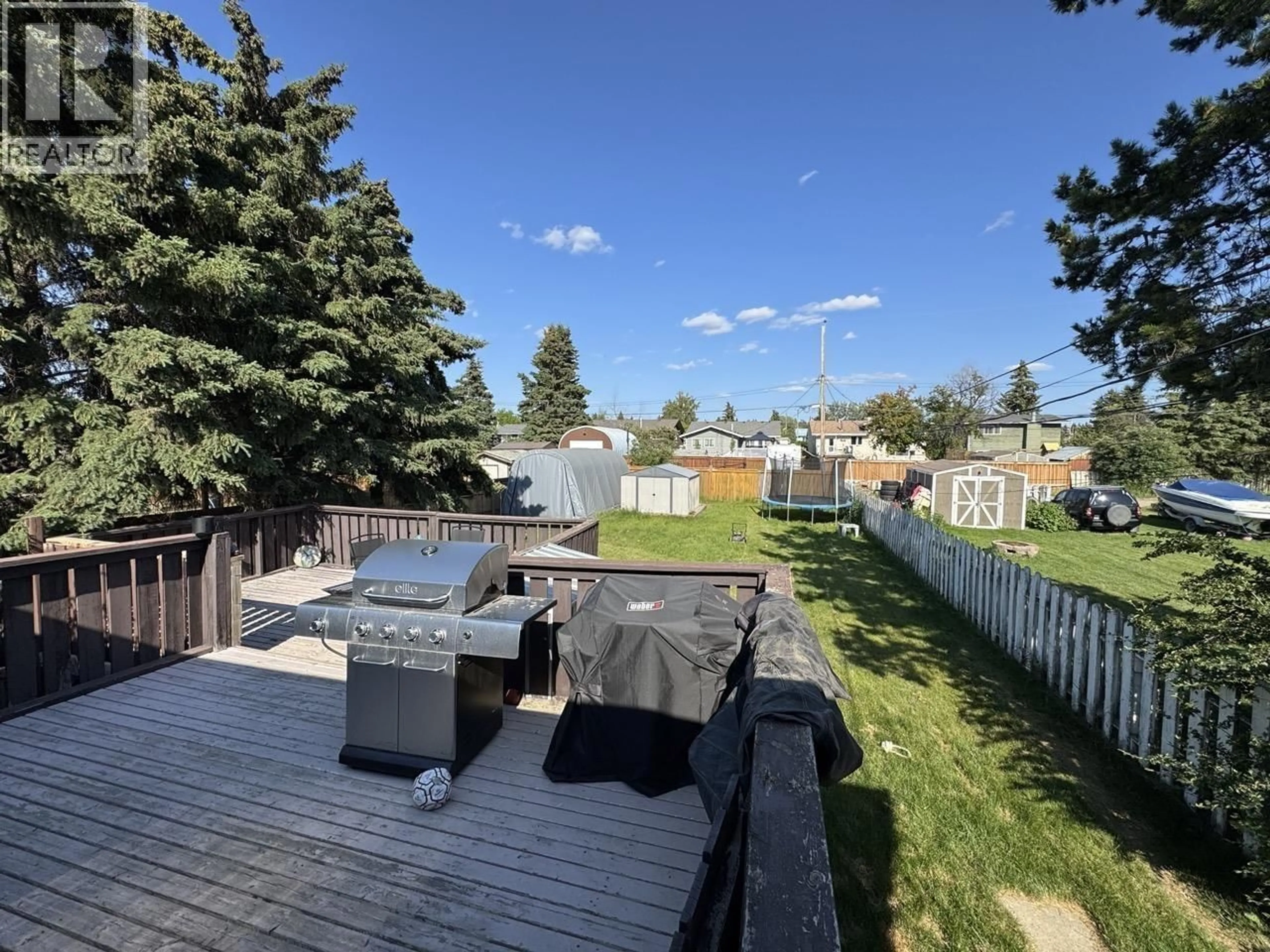 A pic from outside/outdoor area/front of a property/back of a property/a pic from drone, unknown for 8911 91 STREET, Fort St. John British Columbia V1J4T4