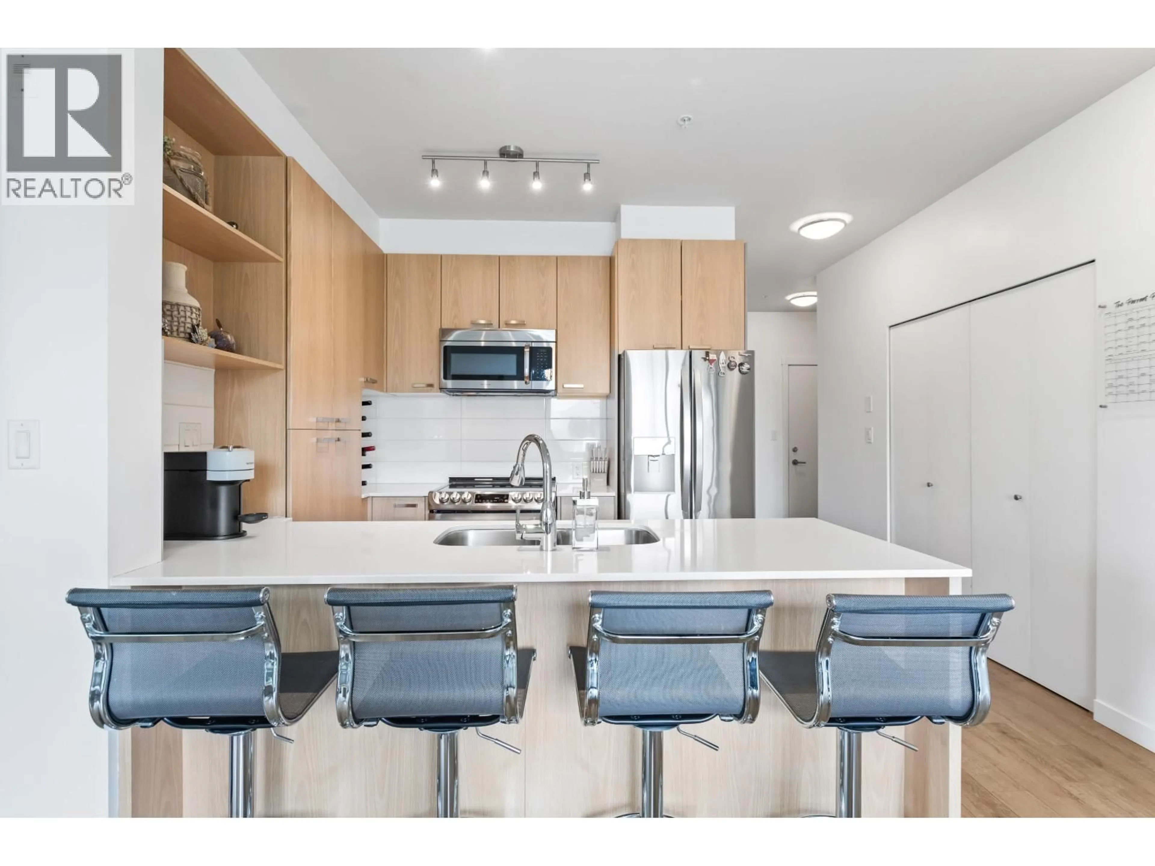Open concept kitchen, unknown for 307 - 20331 DEWDNEY TRUNK ROAD, Maple Ridge British Columbia V2X3C9