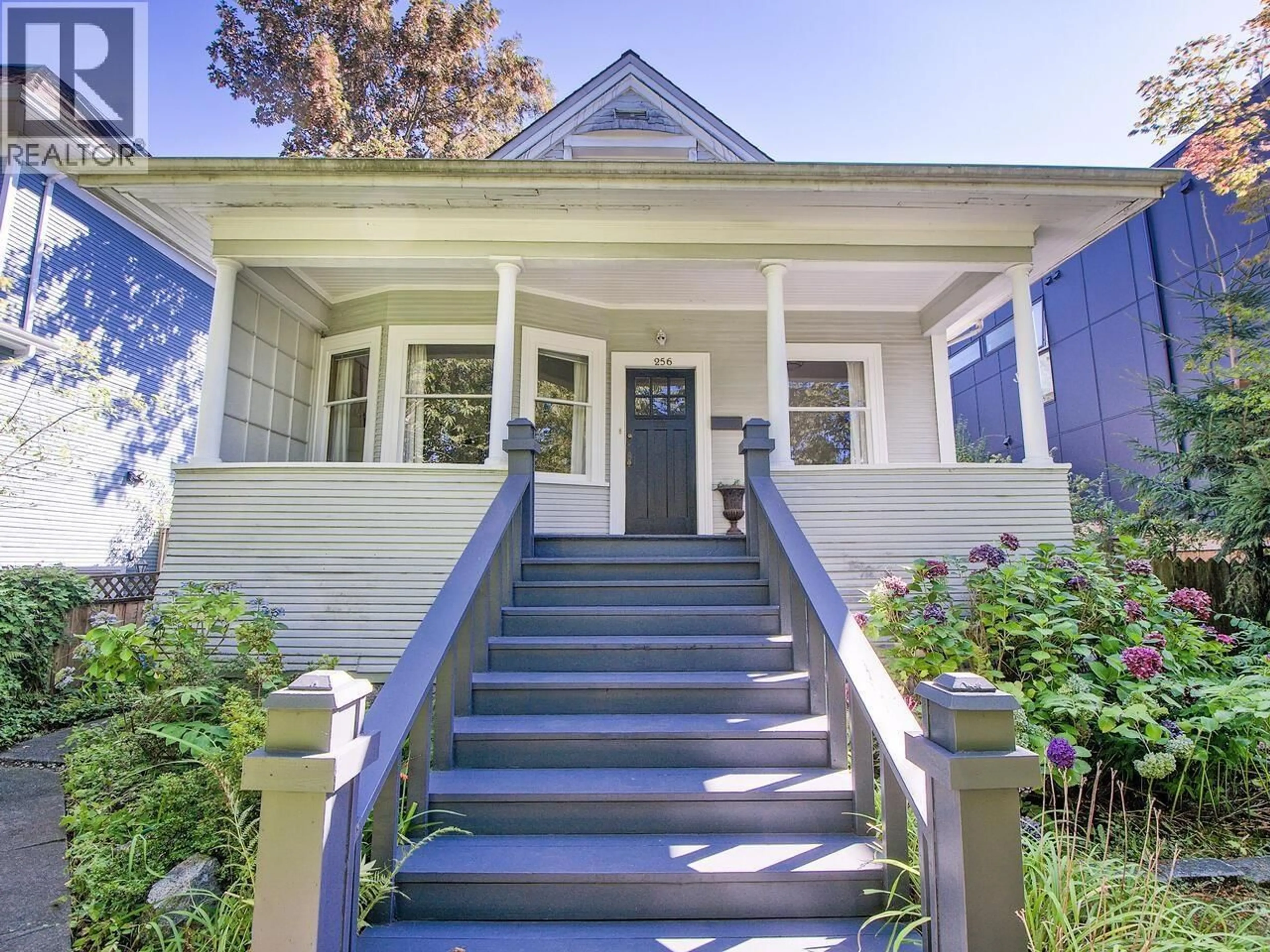 Home with vinyl exterior material, street for 256 16TH AVENUE, Vancouver British Columbia V5T2T4