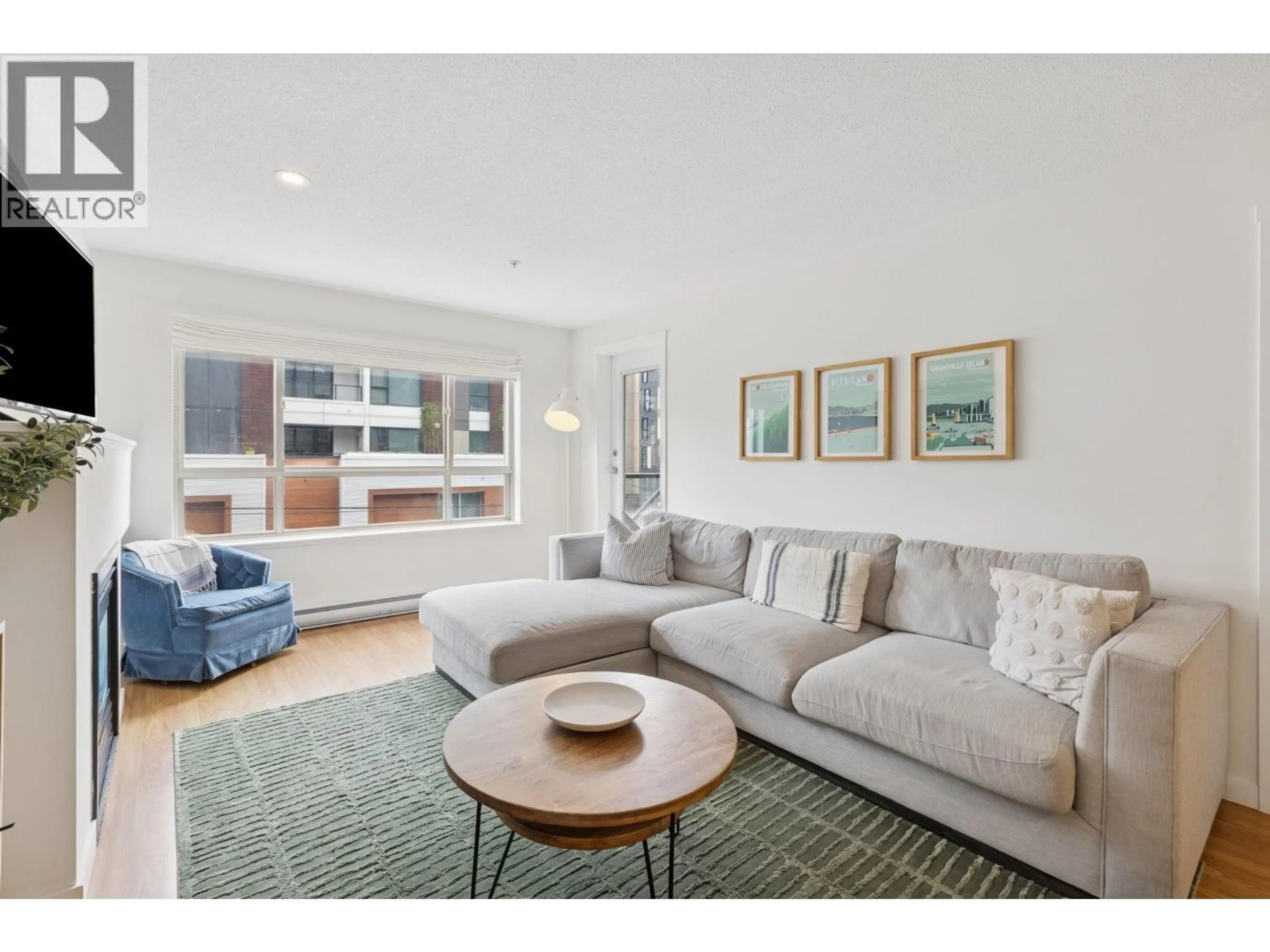 Living room with furniture, unknown for 213 - 38003 SECOND AVENUE, Squamish British Columbia V8B0C4