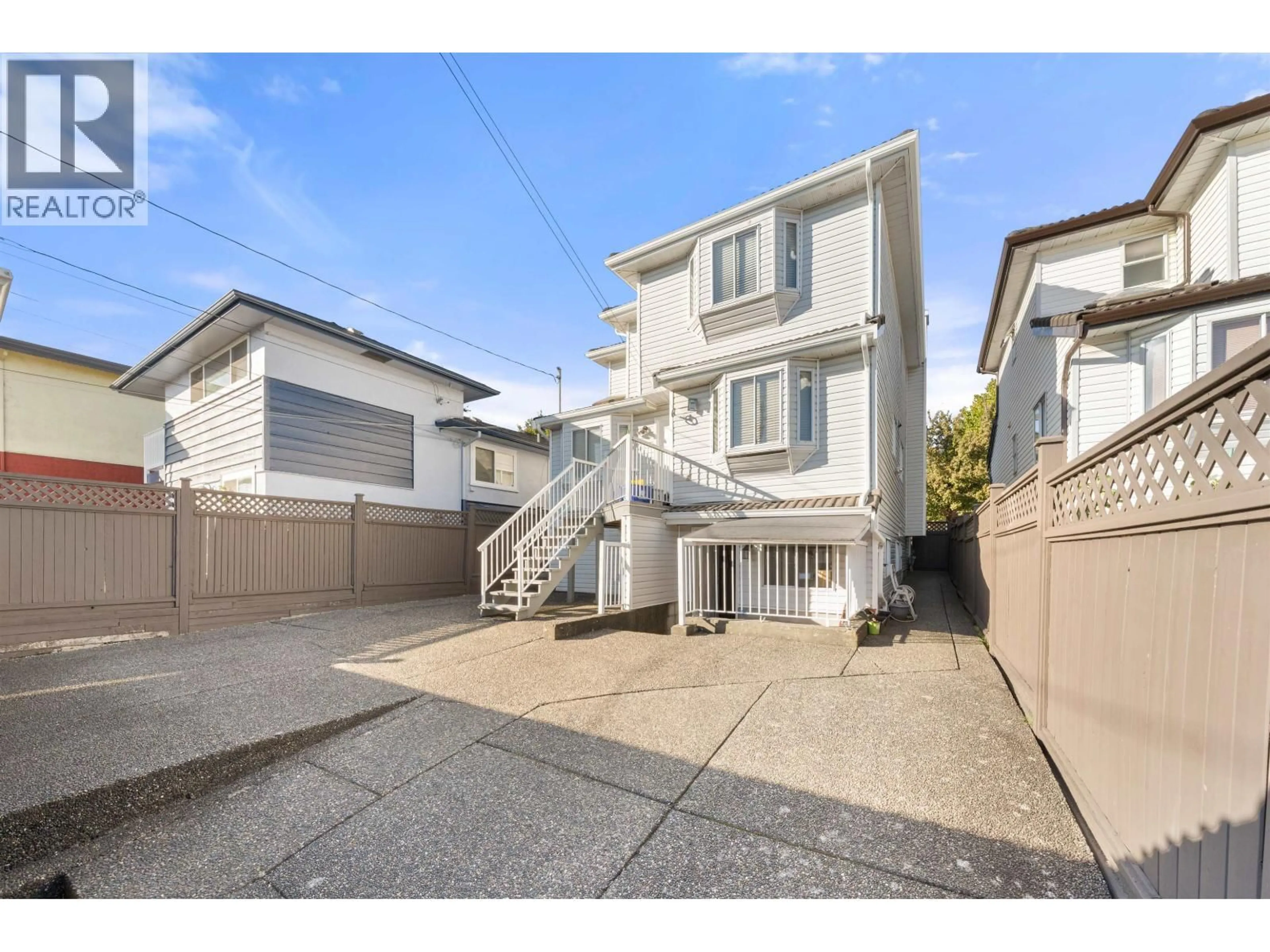 A pic from outside/outdoor area/front of a property/back of a property/a pic from drone, street for 1288 59TH AVENUE, Vancouver British Columbia V5X1Y9