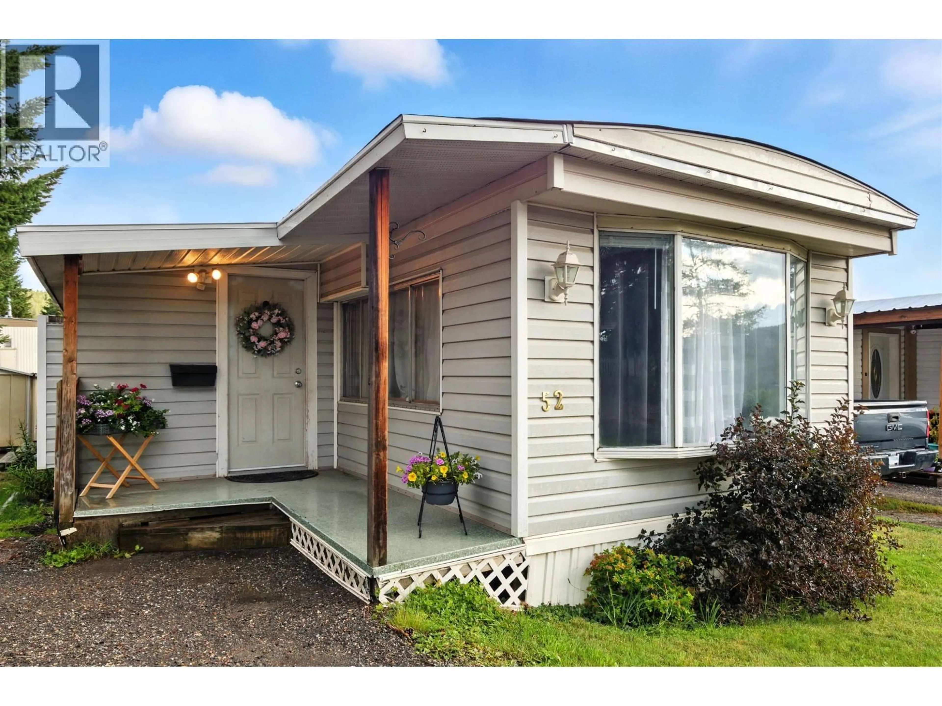 Home with vinyl exterior material, street for 52 - 770 ELEVENTH AVENUE, Williams Lake British Columbia V2G2M4