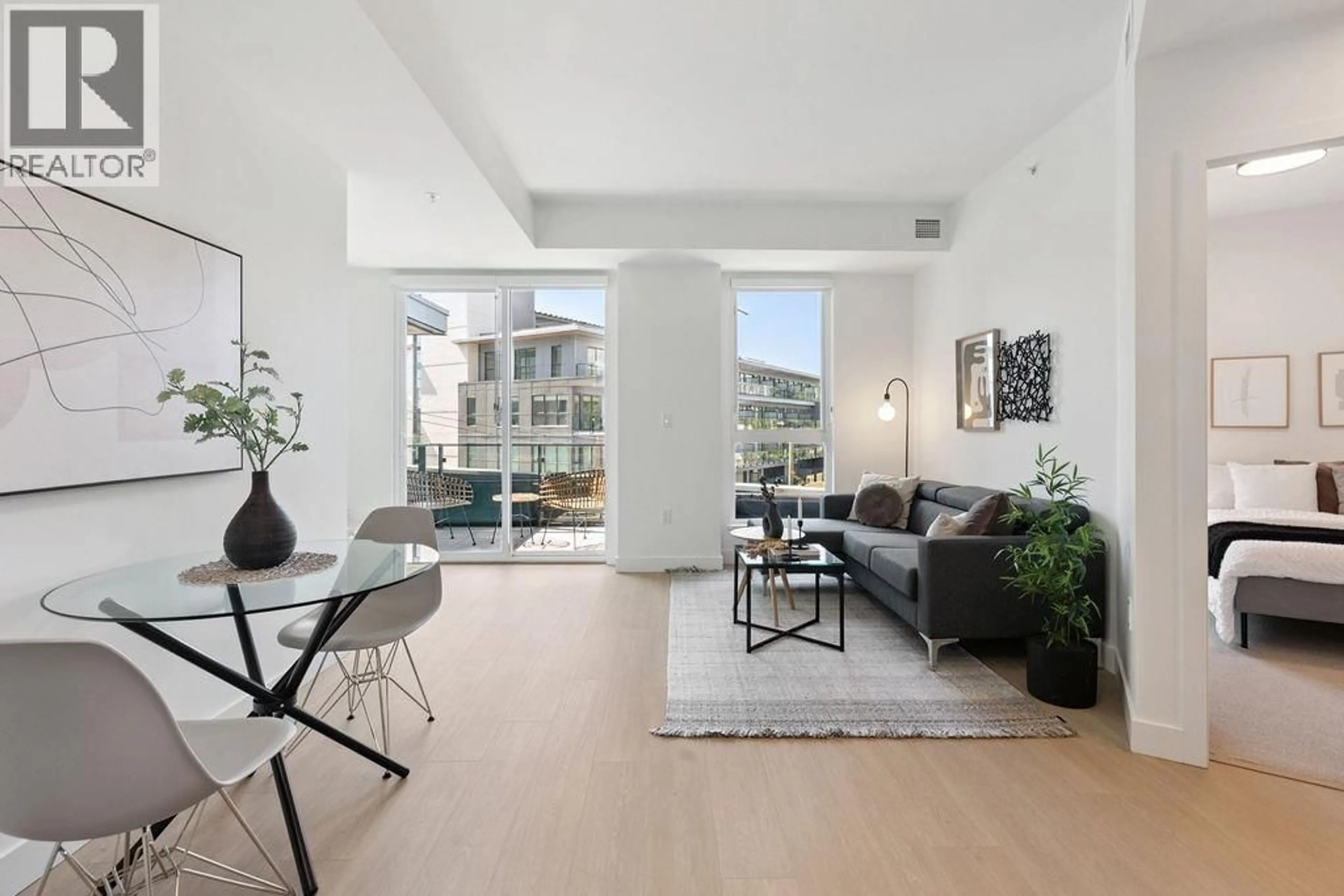 Living room with furniture, unknown for 202 - 333 ST. DAVID'S AVENUE, North Vancouver British Columbia V7L3P2