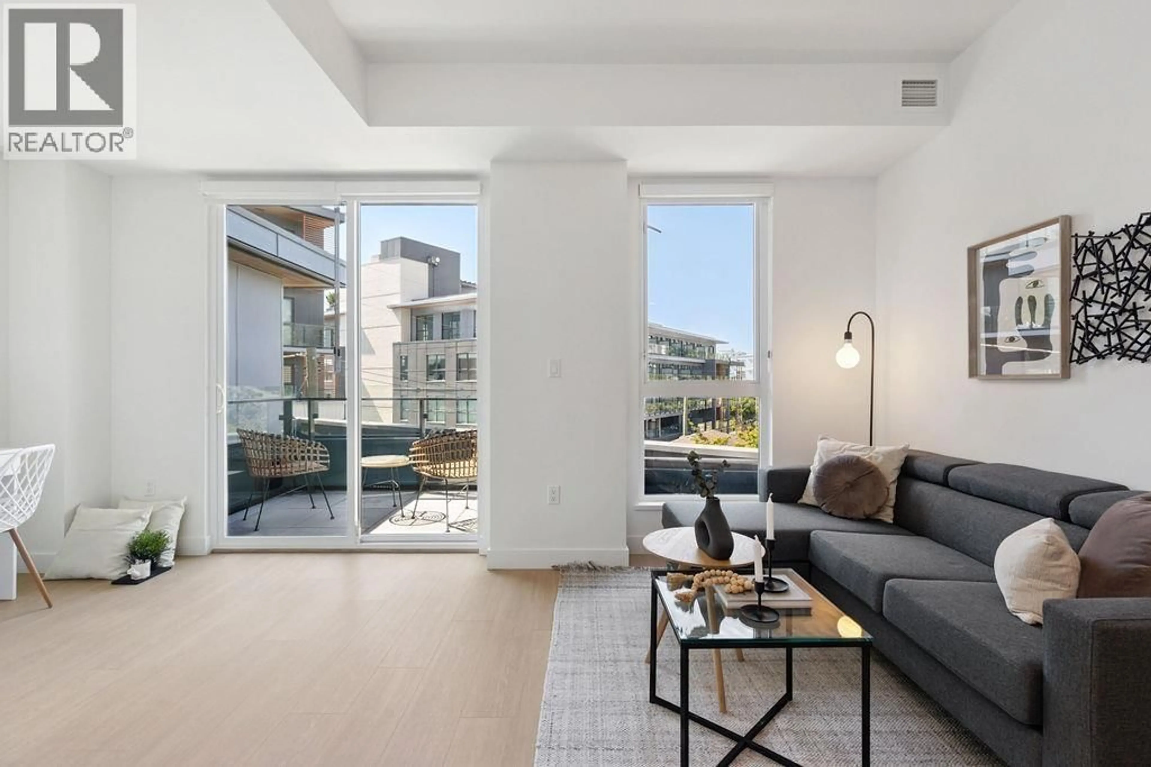Living room with furniture, unknown for 202 - 333 ST. DAVID'S AVENUE, North Vancouver British Columbia V7L3P2