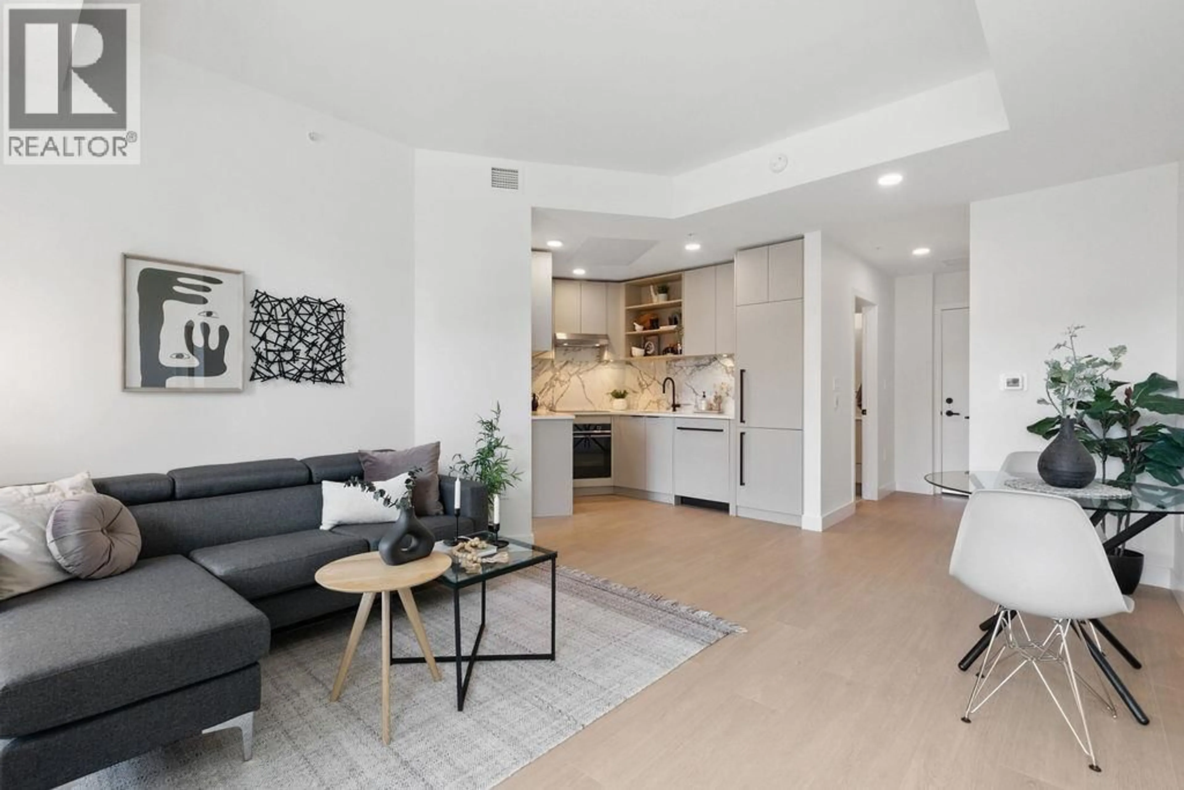 Living room with furniture, unknown for 202 - 333 ST. DAVID'S AVENUE, North Vancouver British Columbia V7L3P2
