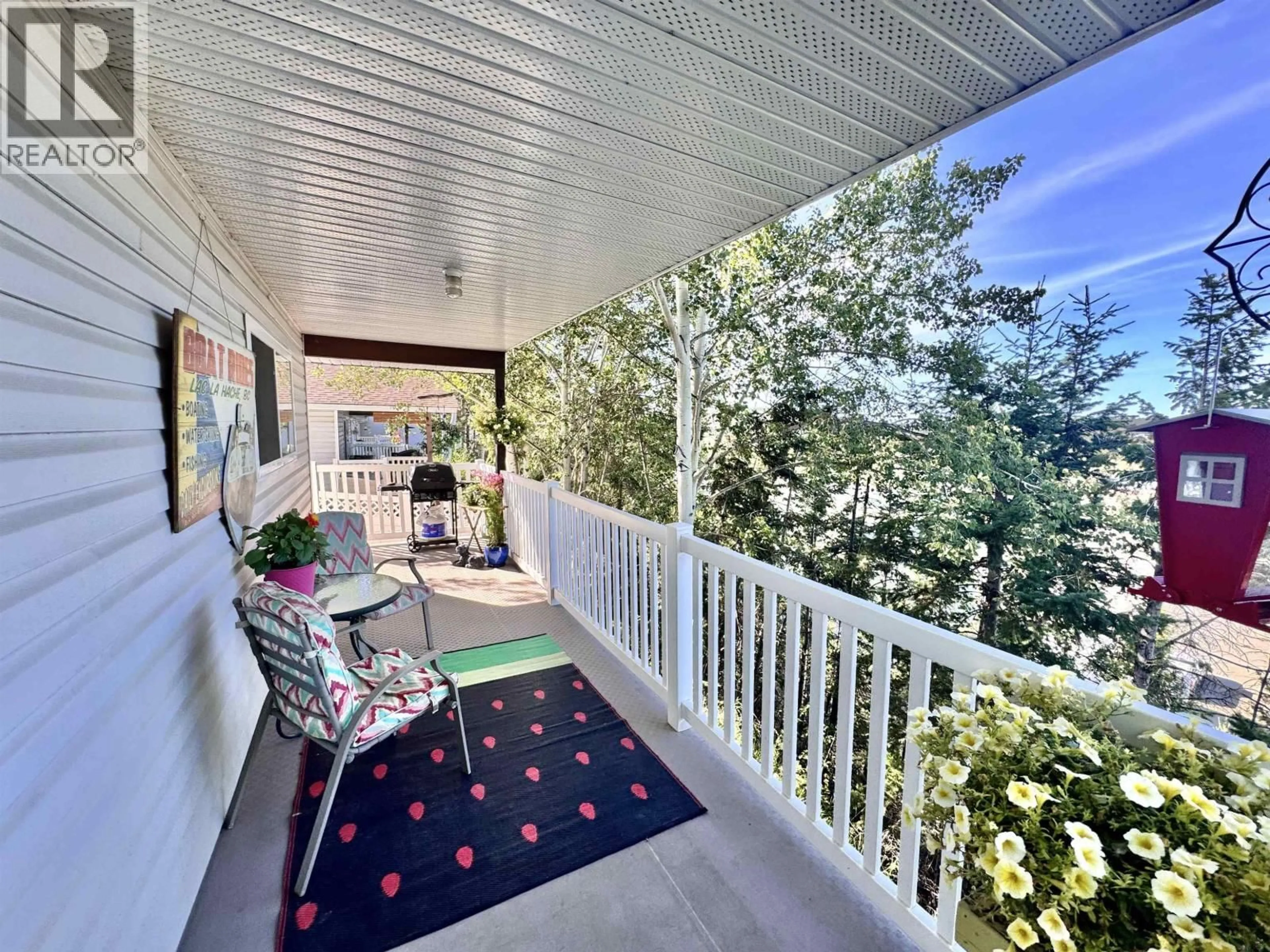Patio, water/lake/river/ocean view for 5 - 202 8TH STREET, 100 Mile House British Columbia V0K2E0