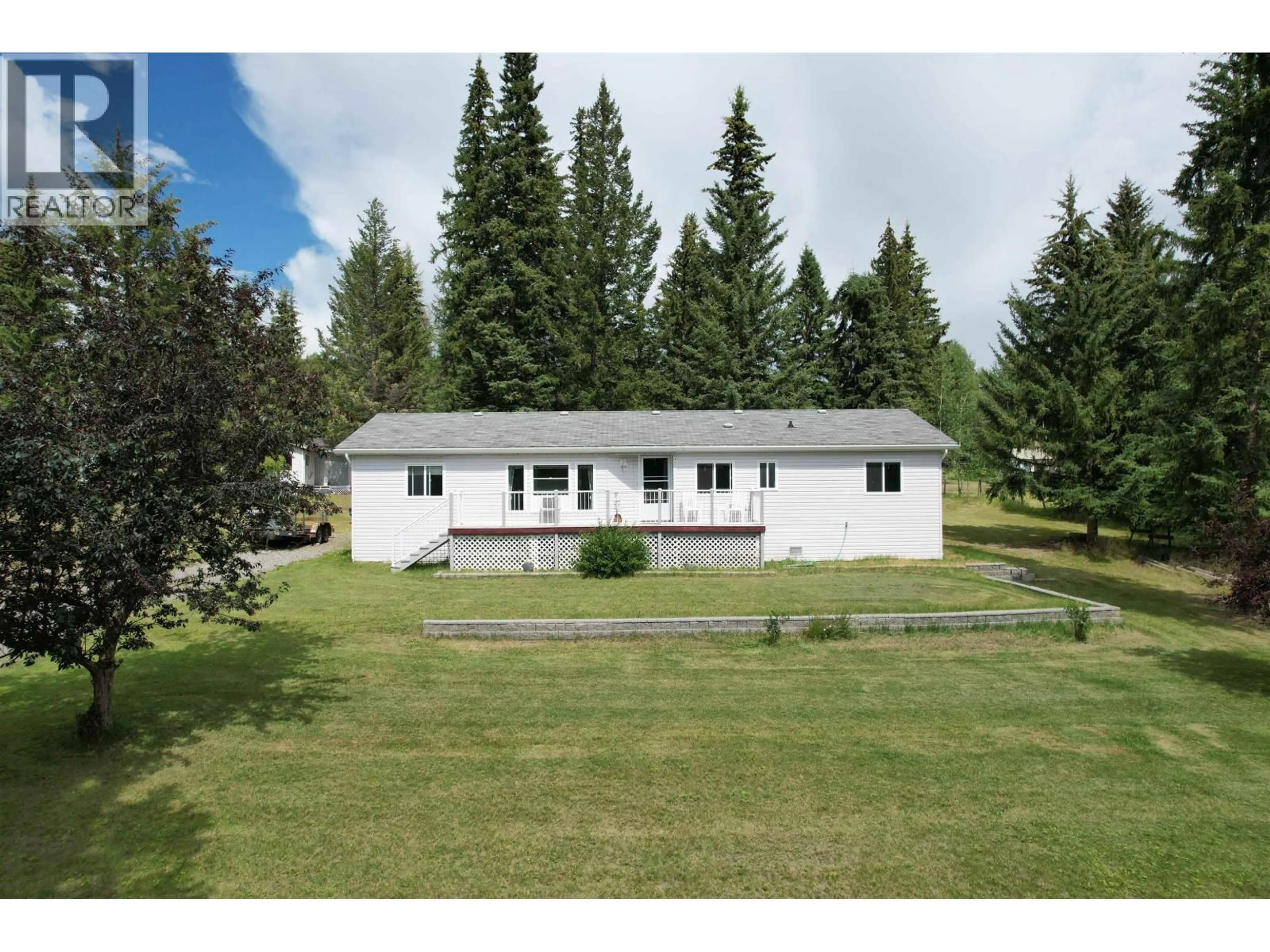 A pic from outside/outdoor area/front of a property/back of a property/a pic from drone, unknown for 6089 LAKESHORE DRIVE, 100 Mile House British Columbia V0K2E3