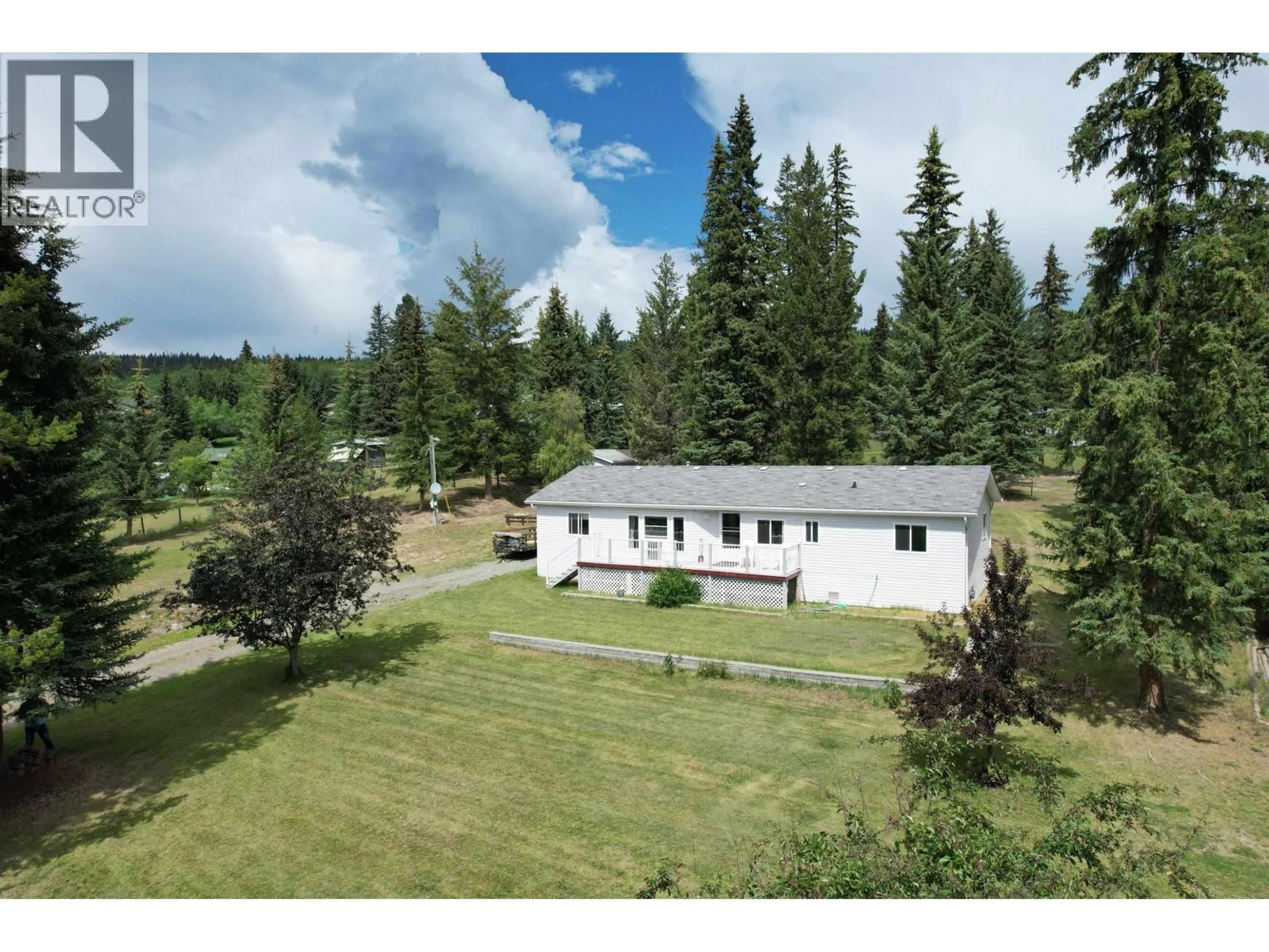 A pic from outside/outdoor area/front of a property/back of a property/a pic from drone, unknown for 6089 LAKESHORE DRIVE, 100 Mile House British Columbia V0K2E3