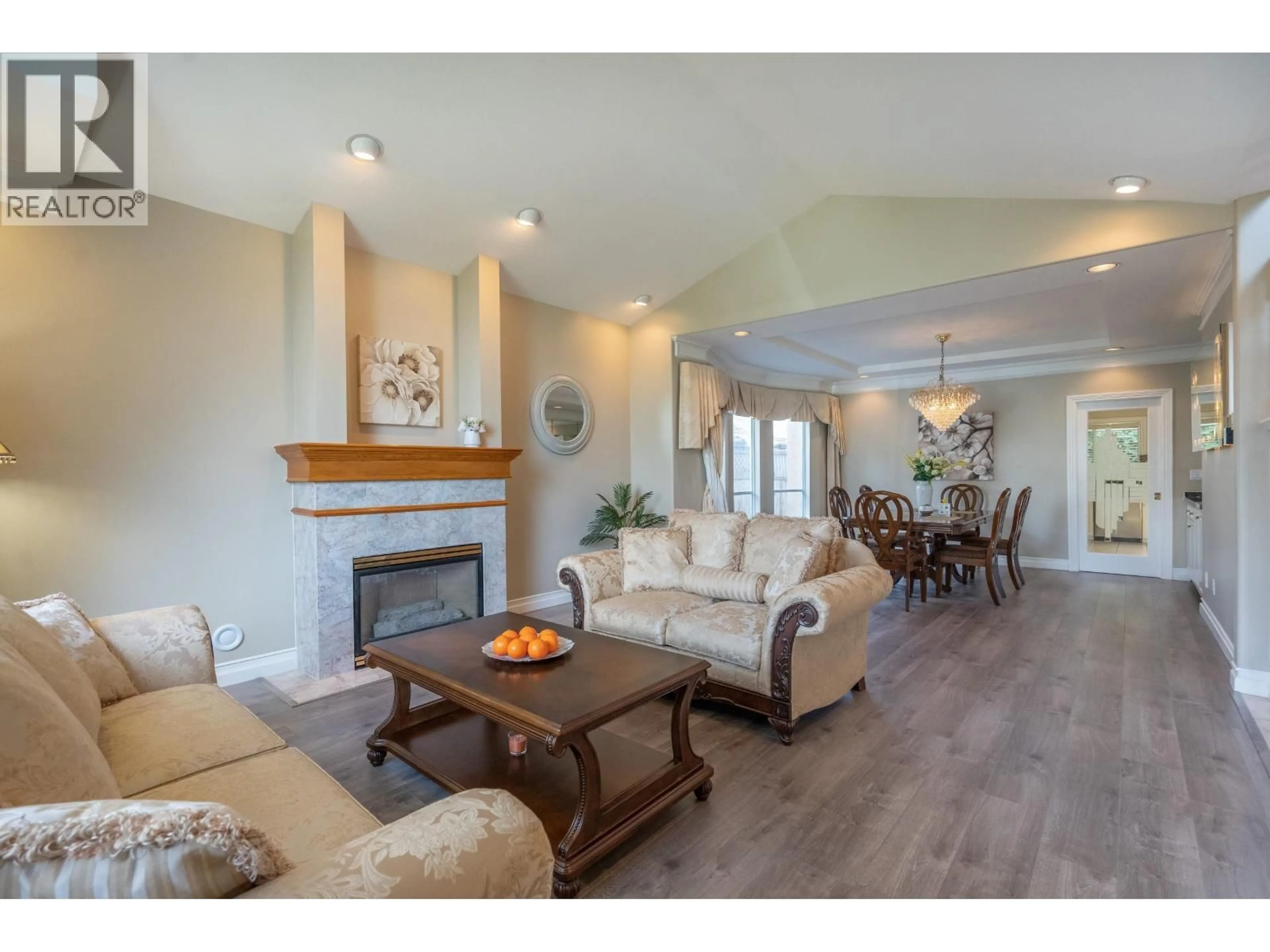 Living room with furniture, wood/laminate floor for 5940 COLVILLE ROAD, Richmond British Columbia V7C3G1