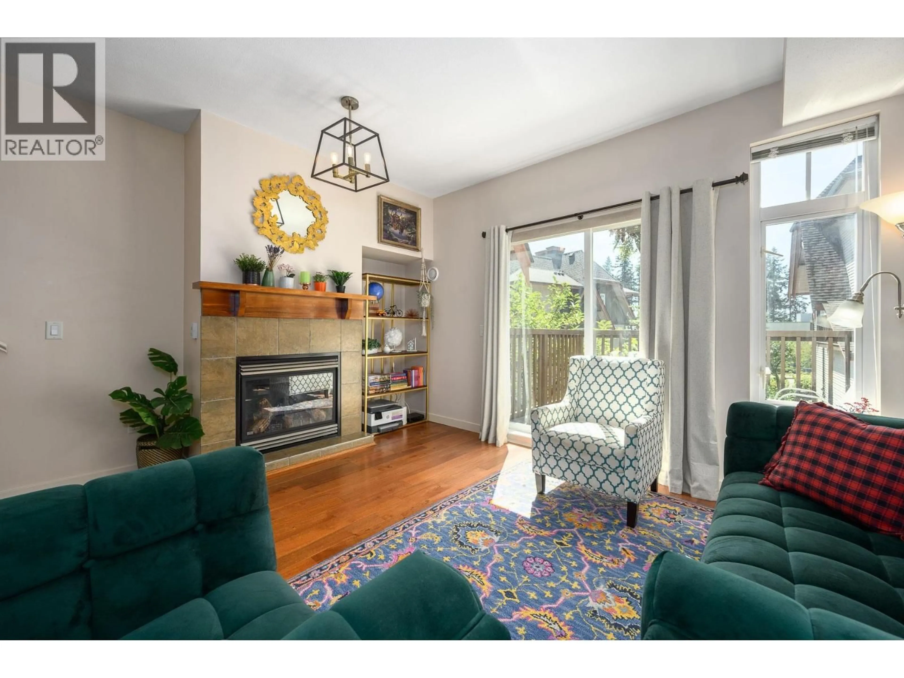 Living room with furniture, wood/laminate floor for 29 - 2000 PANORAMA DRIVE, Port Moody British Columbia V3H5J5