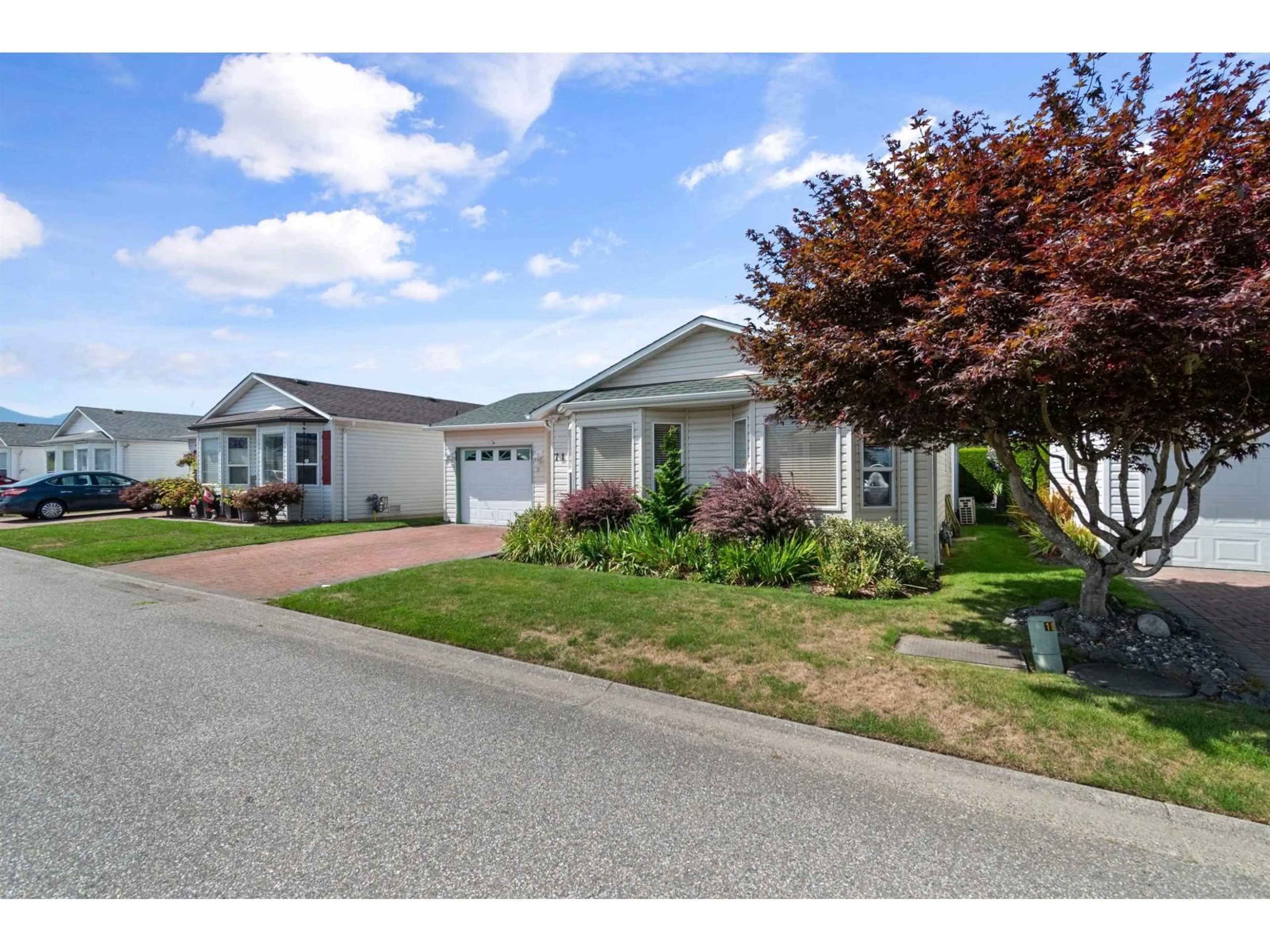 Home with vinyl exterior material, street for 71 - 45918 KNIGHT ROAD, Chilliwack British Columbia V2R3X4