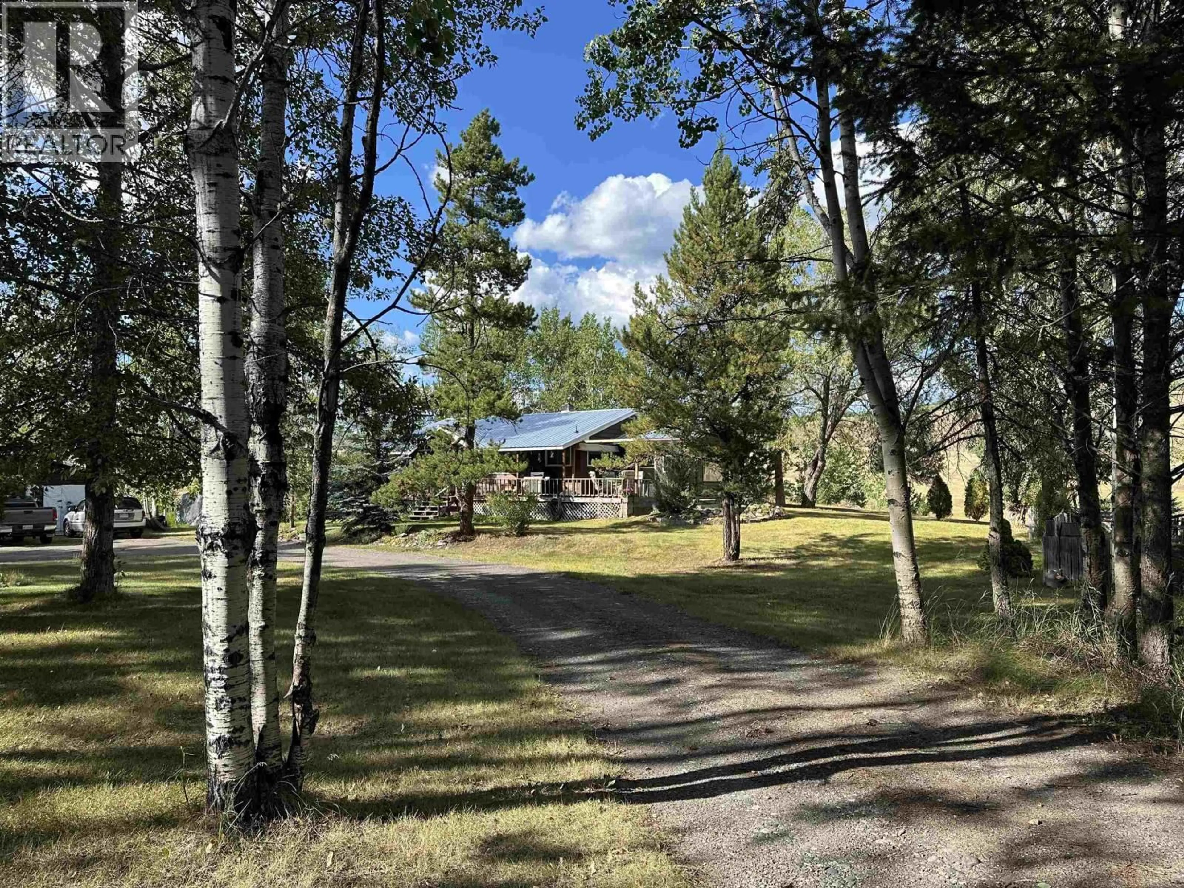 A pic from outside/outdoor area/front of a property/back of a property/a pic from drone, forest/trees view for 4119 CARIBOO 97 HIGHWAY, Lac La Hache British Columbia V0K1P0