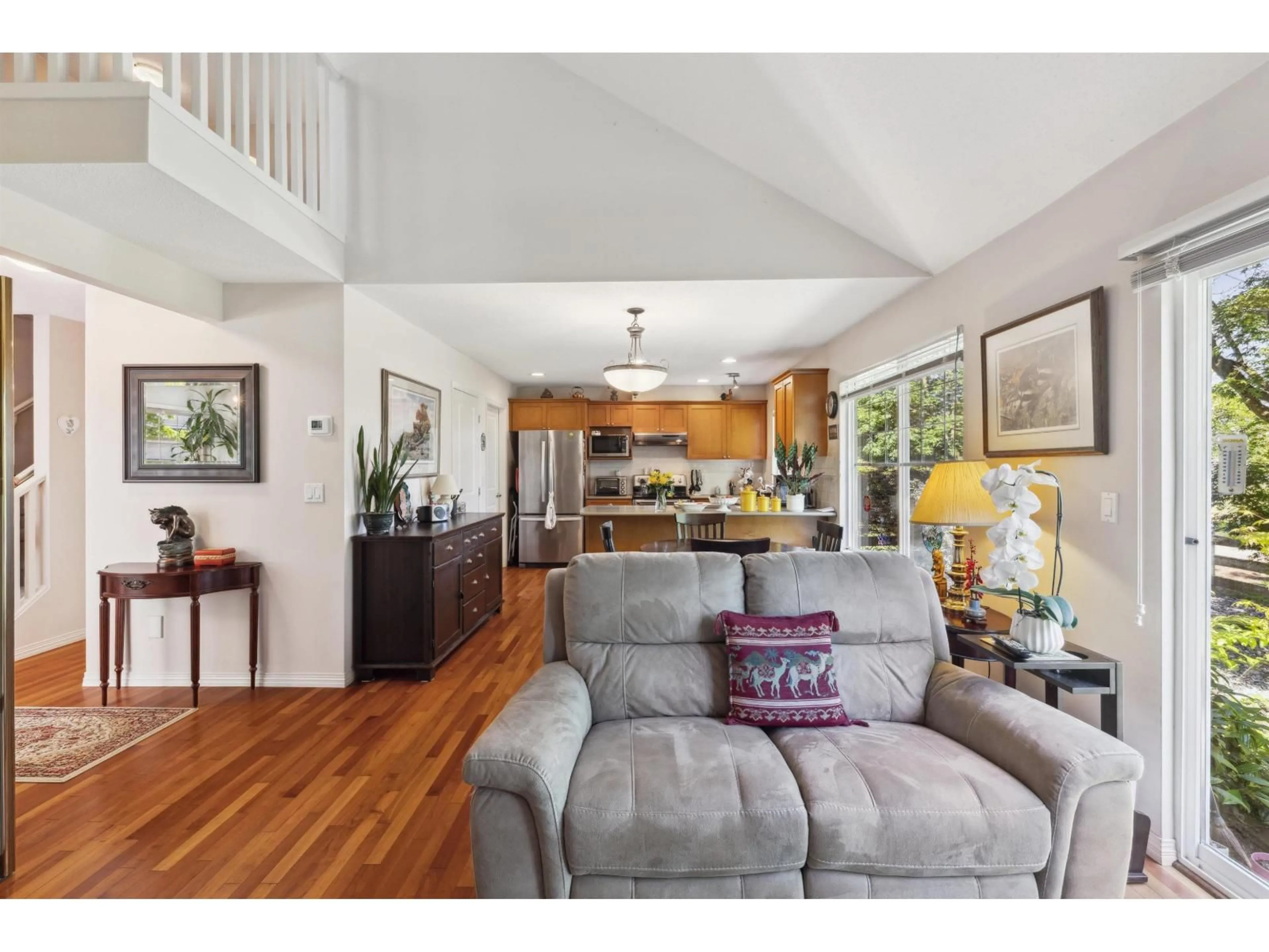Living room with furniture, wood/laminate floor for 49 - 17097 64, Surrey British Columbia V3S1Y5