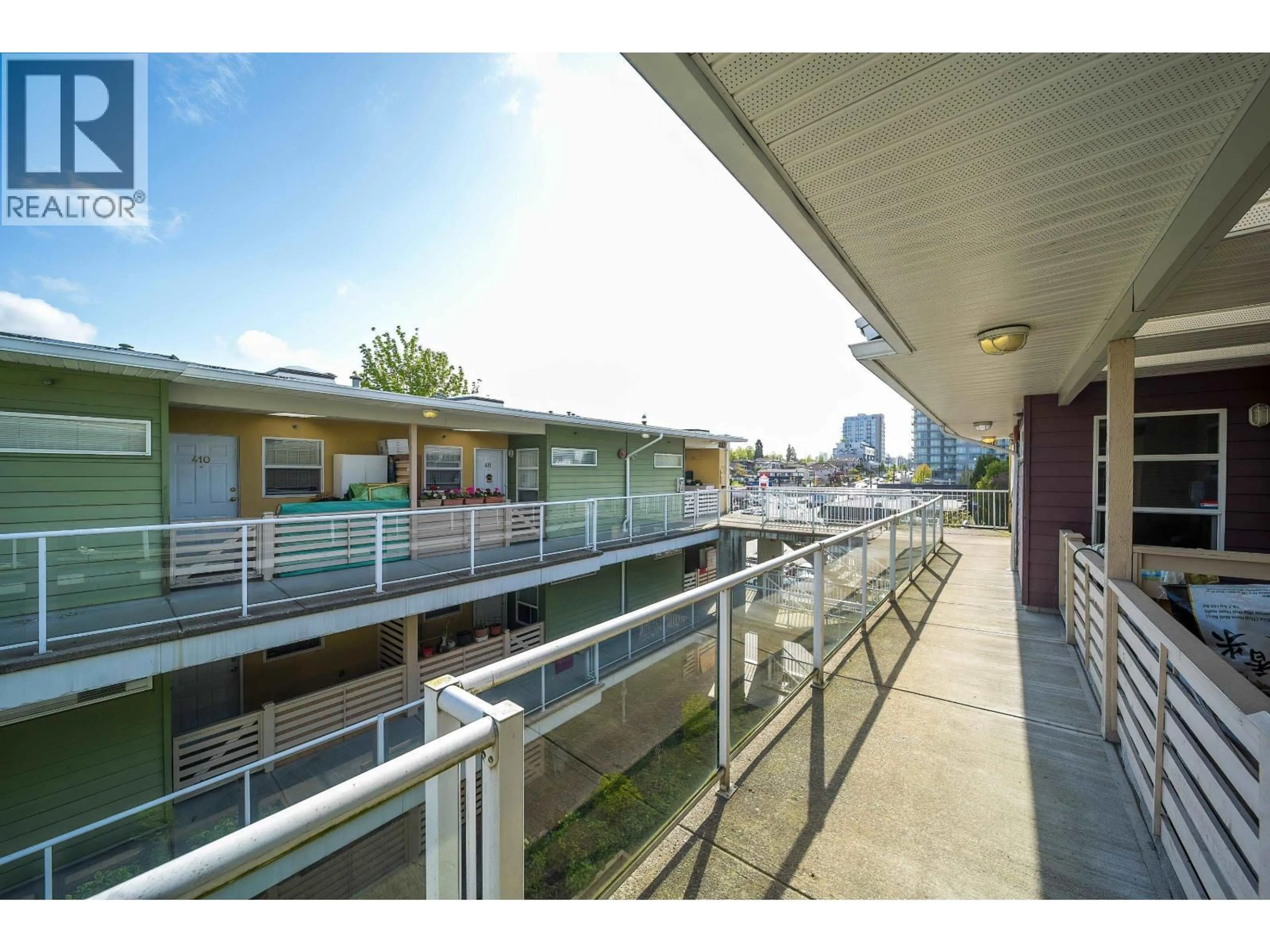 Patio, city buildings view from balcony for 416 - 2238 KINGSWAY, Vancouver British Columbia V5N2T7