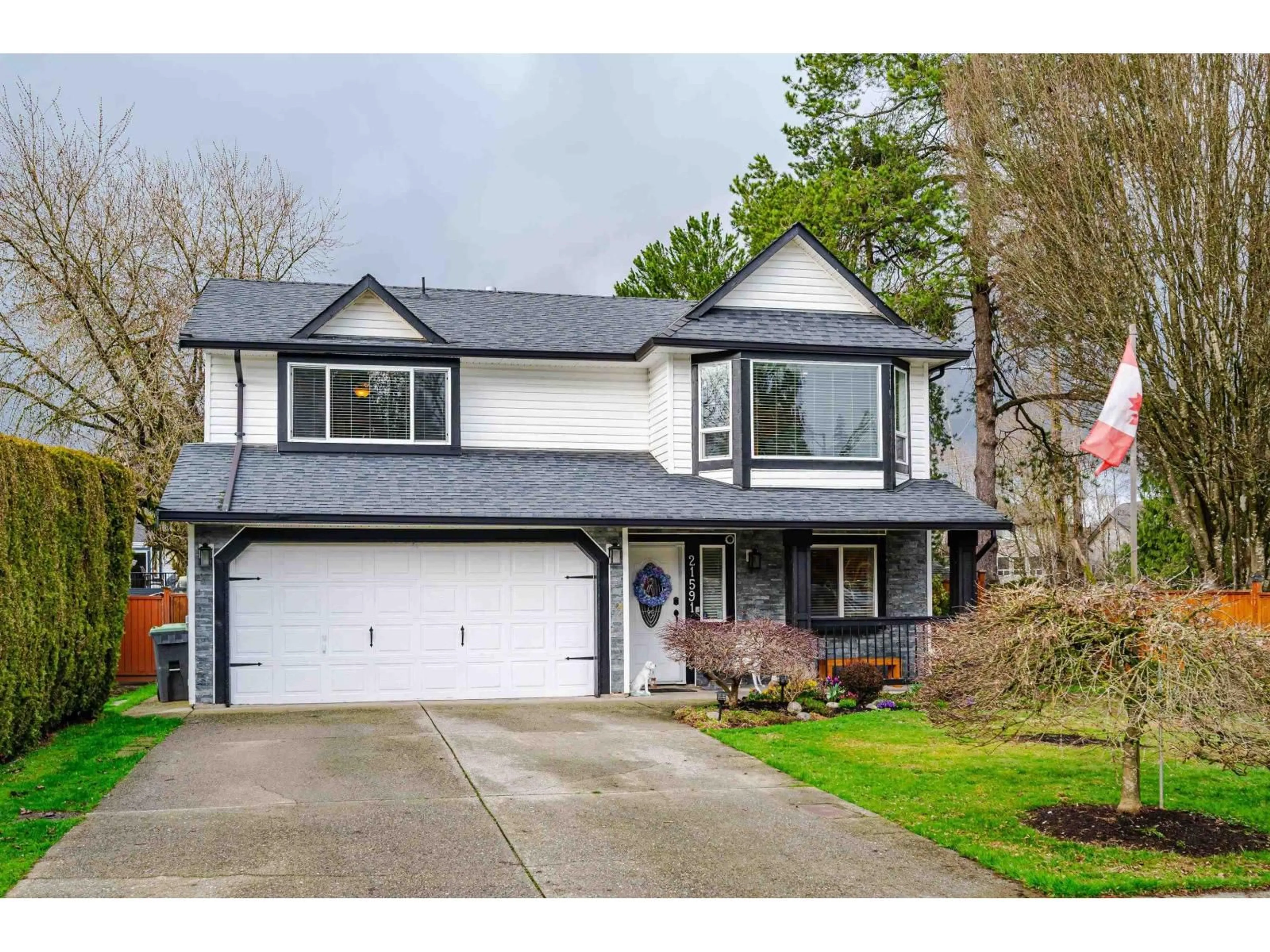 Home with vinyl exterior material, street for 21591 93A, Langley British Columbia V1M2H7