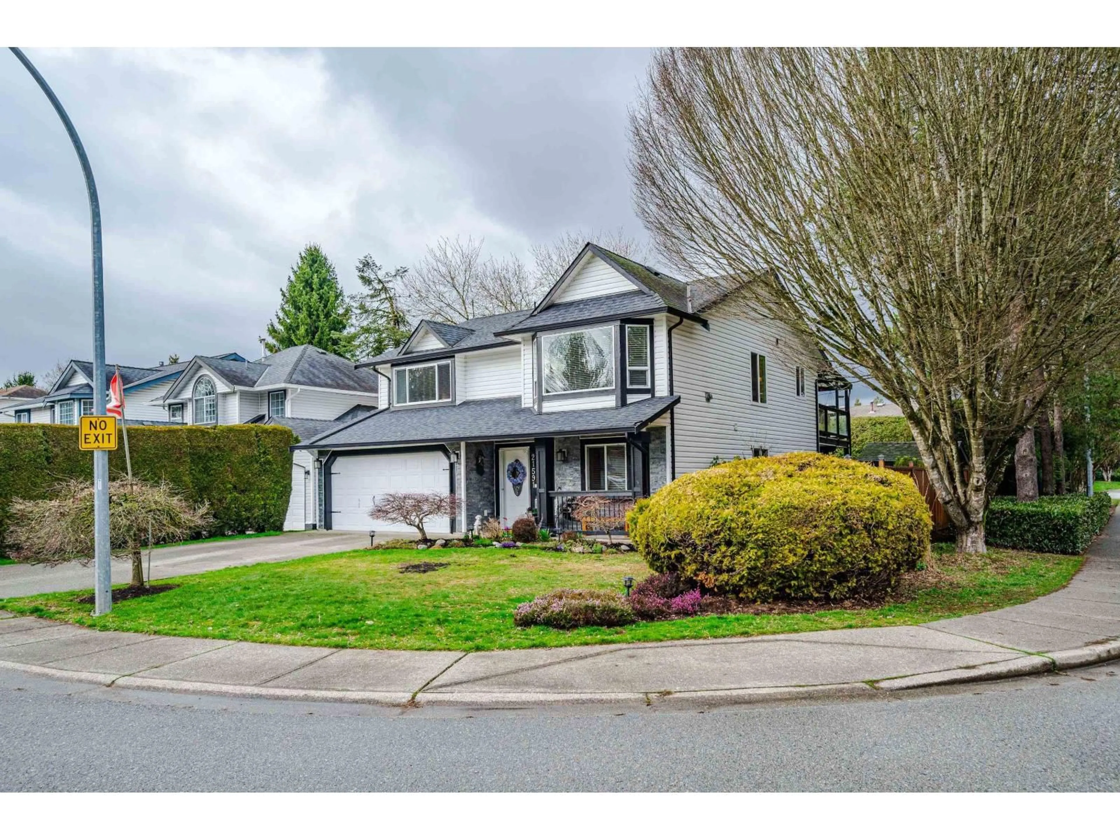 Home with vinyl exterior material, street for 21591 93A, Langley British Columbia V1M2H7